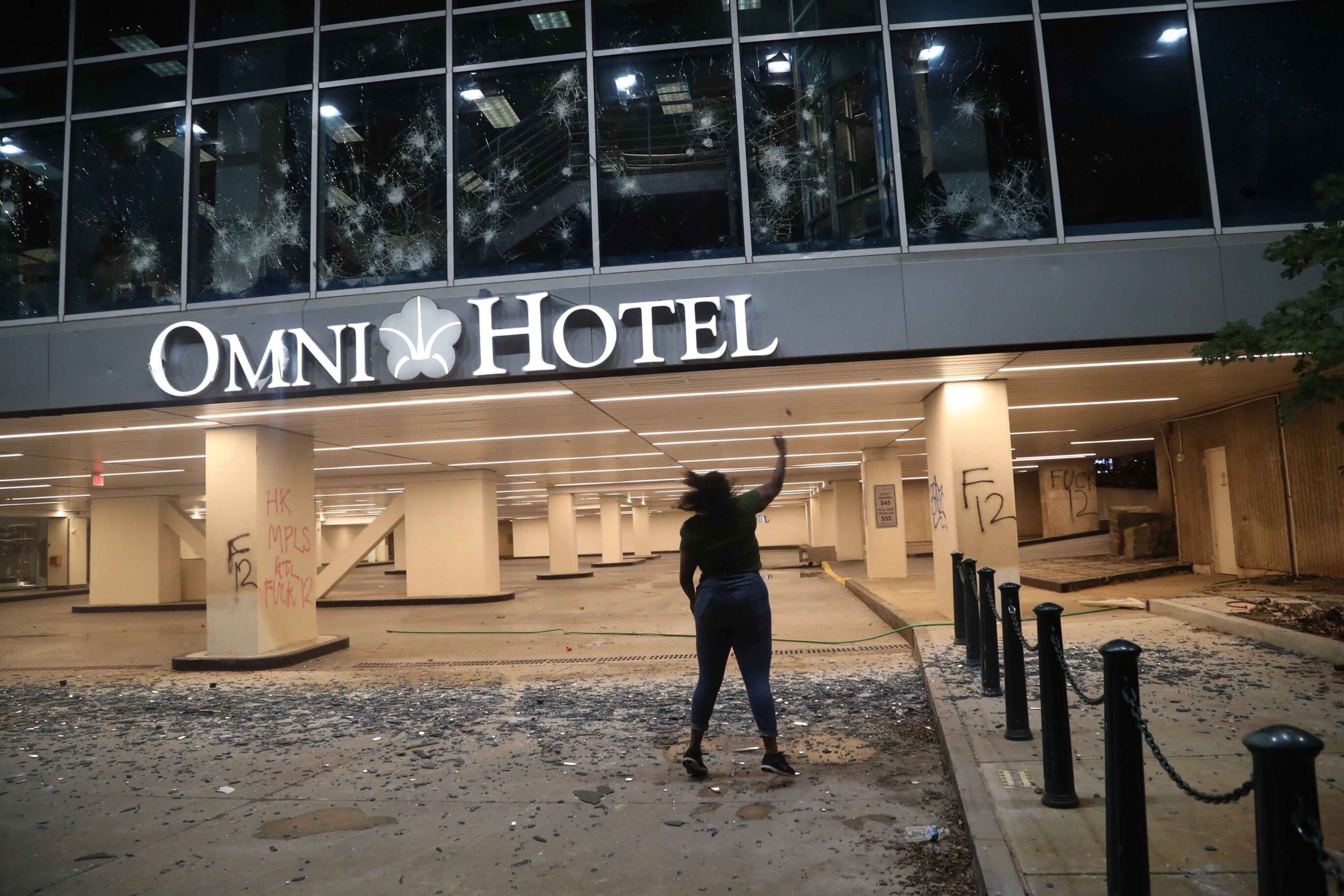 May 29, 2020 - Atlanta - After a peaceful march the Georgia State Capitol that swelled into the hundreds, protestors returned to the area around the Centennial Olympic Park and CNN center where some confronted police, who sprayed some demonstrators with pepper spray. They carried signs and chanted their messages of outrage over the death of George Floyd in Minneapolis. Alyssa Pointer / alyssa.pointer@ajc.com