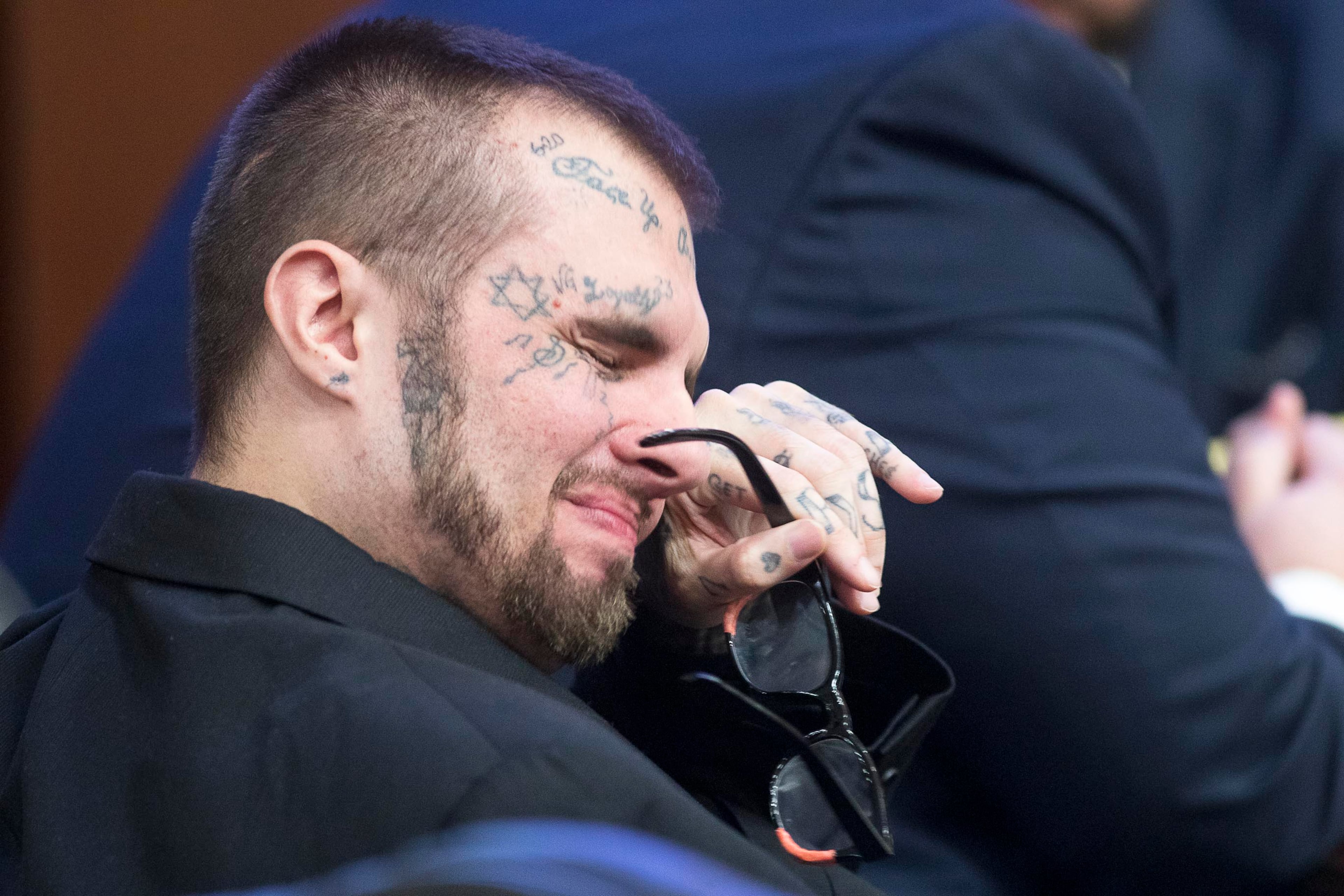 05/13/2019 -- Covington, Georgia -- Christopher McNabb becomes emotional while listening to a recording of a phone conversation he had with hus co-defendant, Cortney Bell, during their murder trial in front of Georgia Chief Superior Court Judge John M. Ott at the Newton County Courthouse in Covington, Monday, May 13, 2019. (ALYSSA POINTER/ALYSSA.POINTER@AJC.COM)