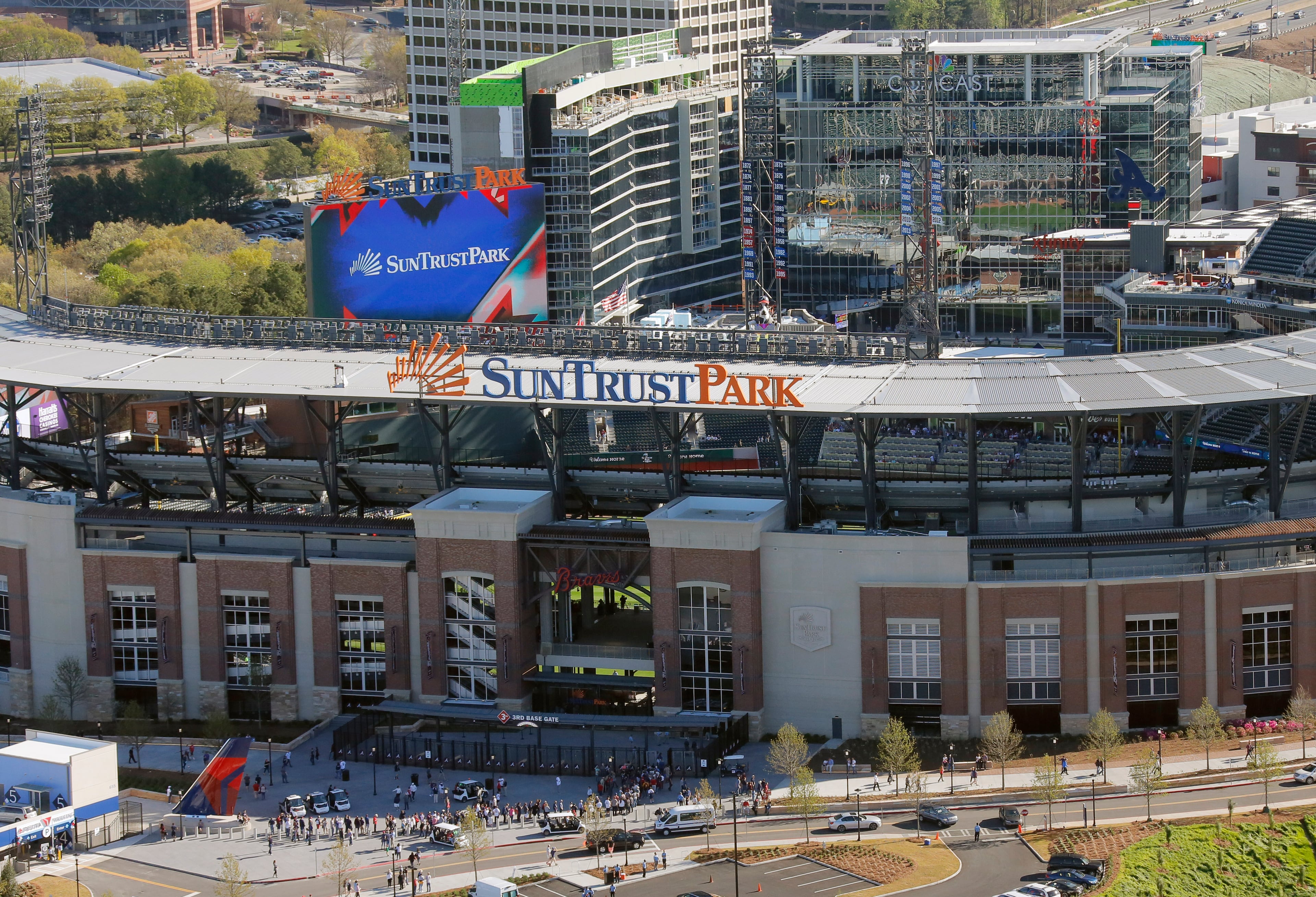 Mar. 31, 2017 - Atlanta - View of SunTrust Park looking west, with Battery Park in the background. The Braves open their new stadium the day after a massive fire destroyed a section of I-85 in downtown Atlanta. BOB ANDRES /BANDRES@AJC.COM