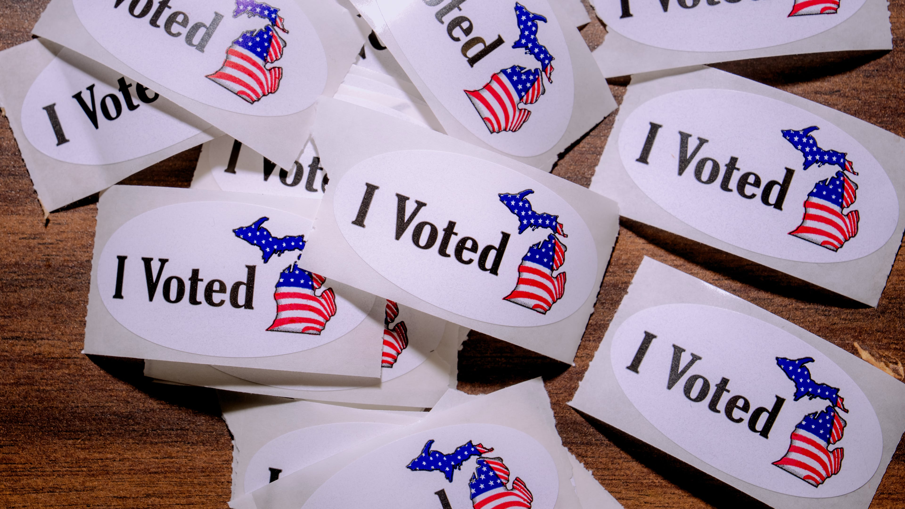 A close-up view of "I Voted" stickers at Maples Elementary School on primary election day, Tuesday, Aug. 4, 2026, in Dearborn, Mich. (AP Photo/Nic Antaya) CORRECTION: Corrects location to Dearborn NOT Detroit