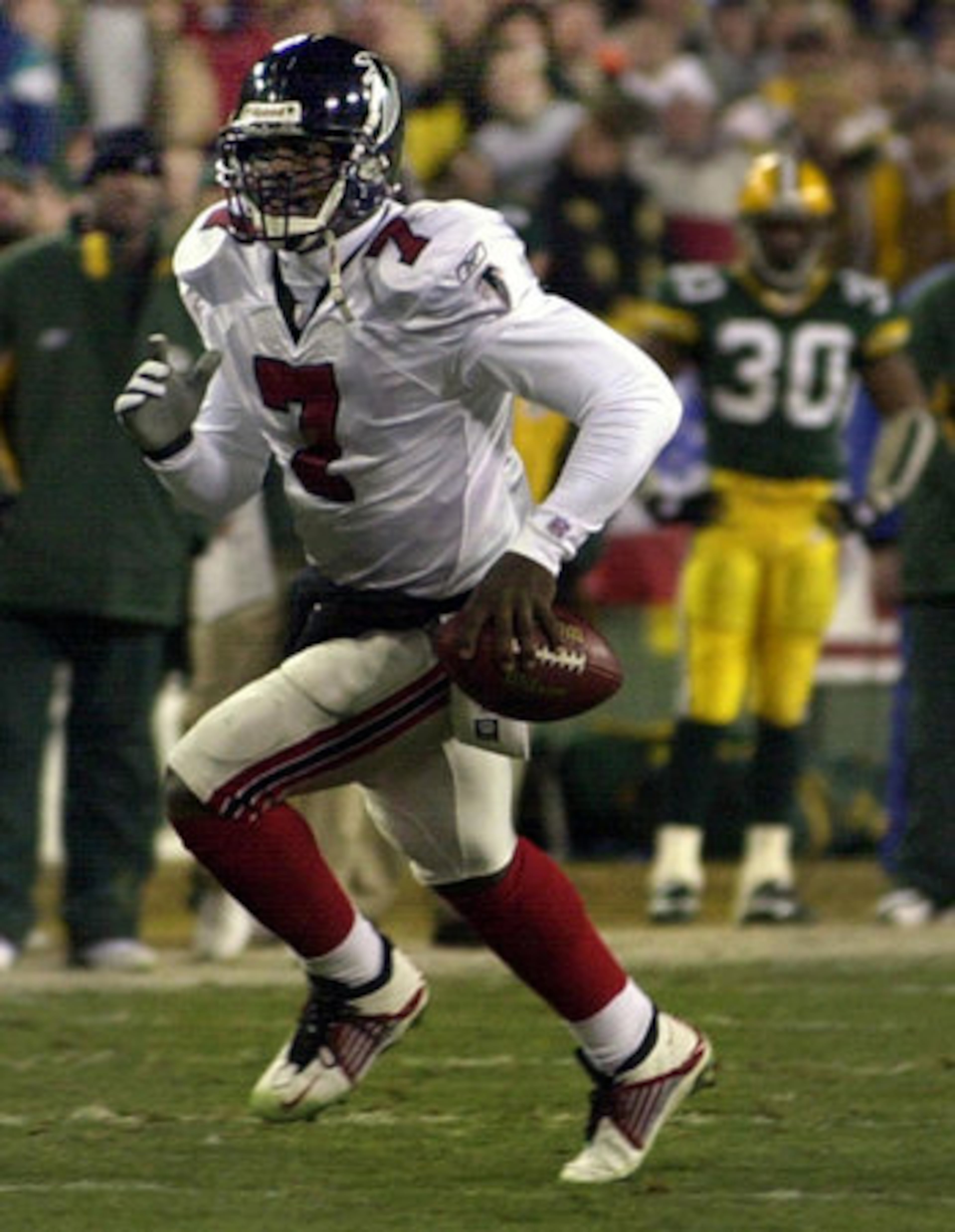 The Associated Press game story following the Falcons' 27-7 playoff win over the Packers in 2003 described Michael Vick as "the 22-year-old improvisational genius." Vick ran for 64 yards in the game.