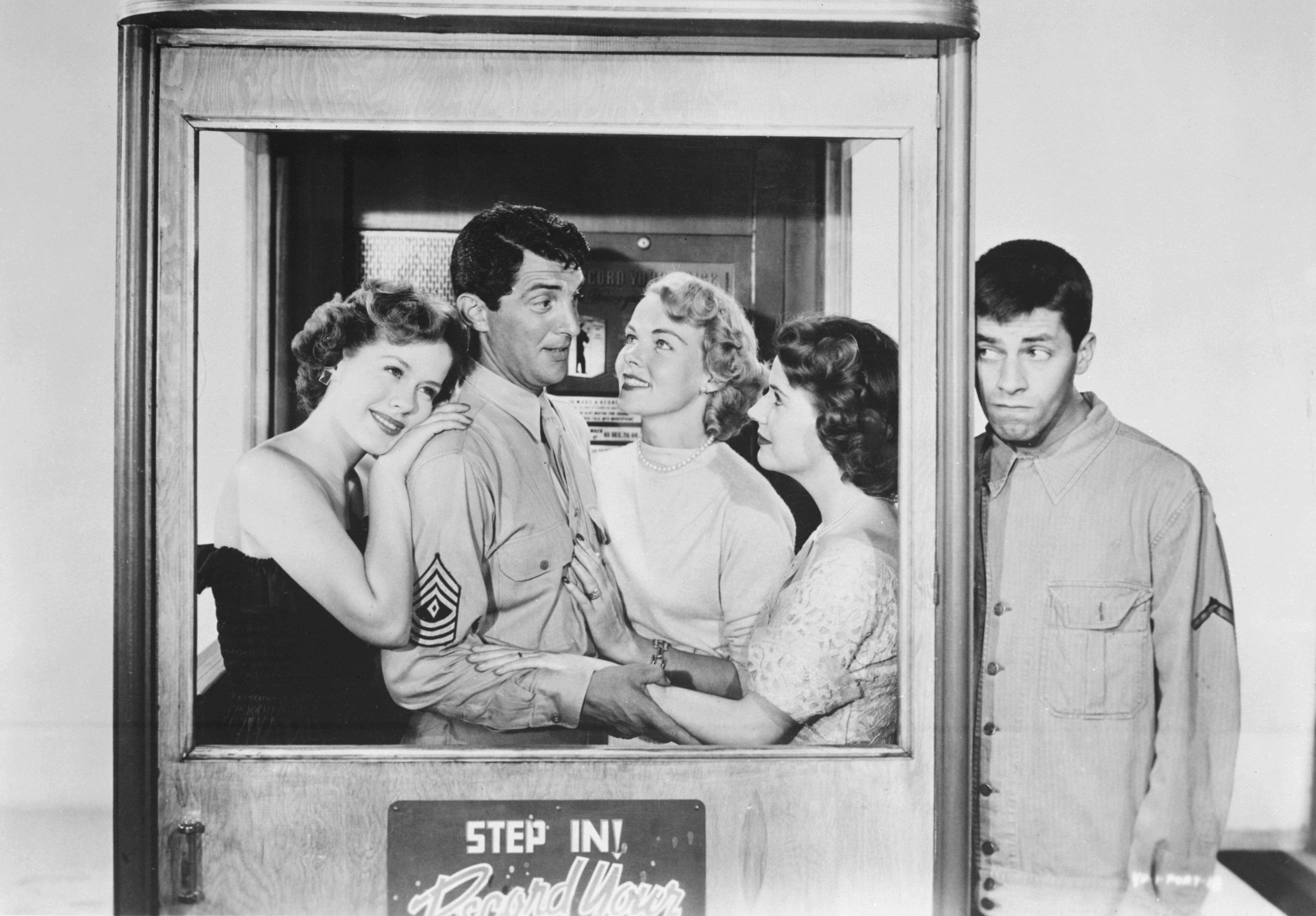 American comedy actors Dean Martin (1917 - 1995, left) and Jerry Lewis in a publicity still for the musical comedy 'At War With The Army', directed by Hal Walker, 1950. The film also features supporting actress Polly Bergen. (Photo by Paramount Pictures/Archive Photos/Hulton Archive/Getty Images)