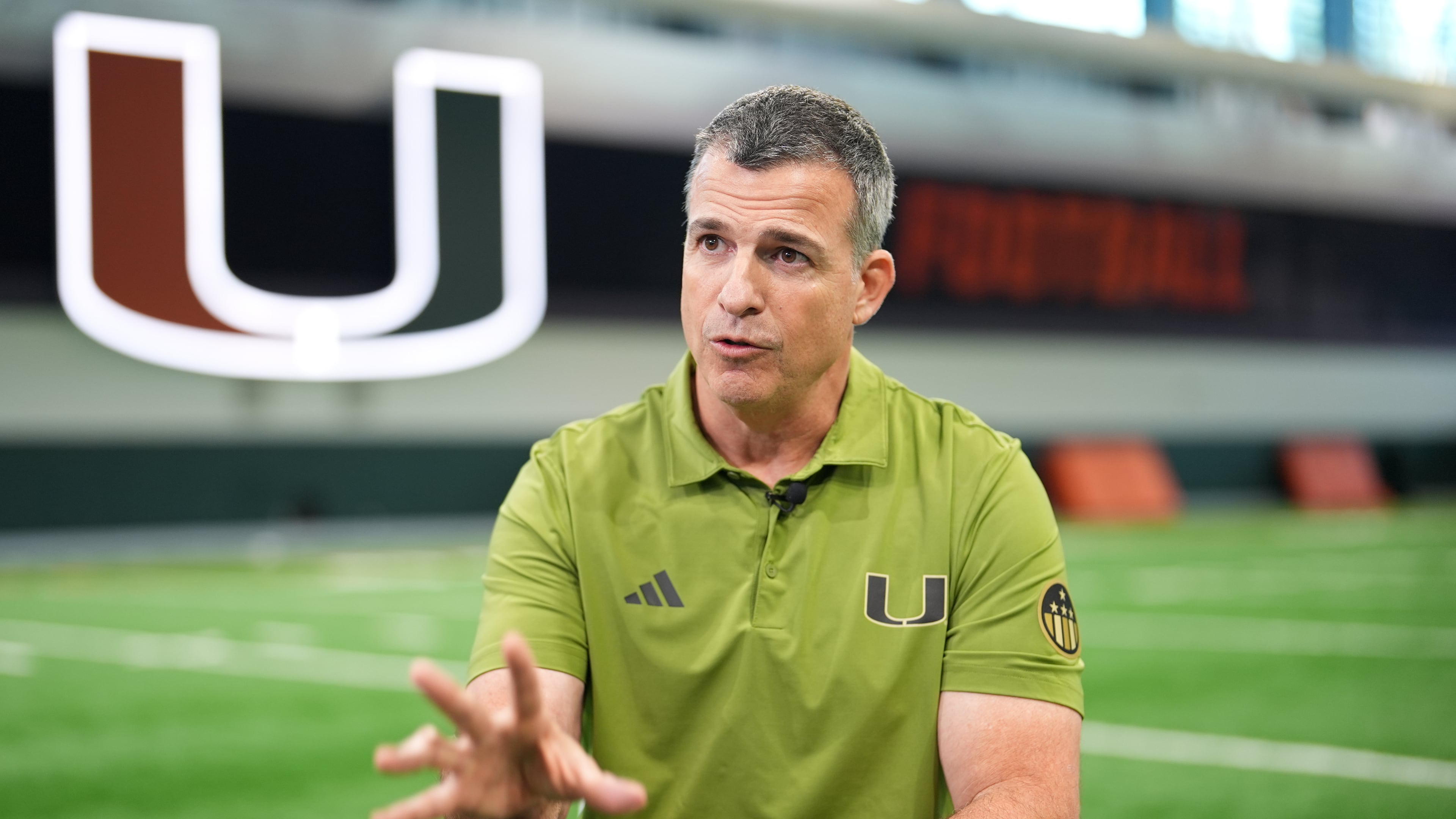 Miami football head coach Mario Cristobal speaks during an interview on the team's indoor practice field in Coral Gables, Fla., Monday, Jan. 12, 2026. (AP Photo/Rebecca Blackwell)