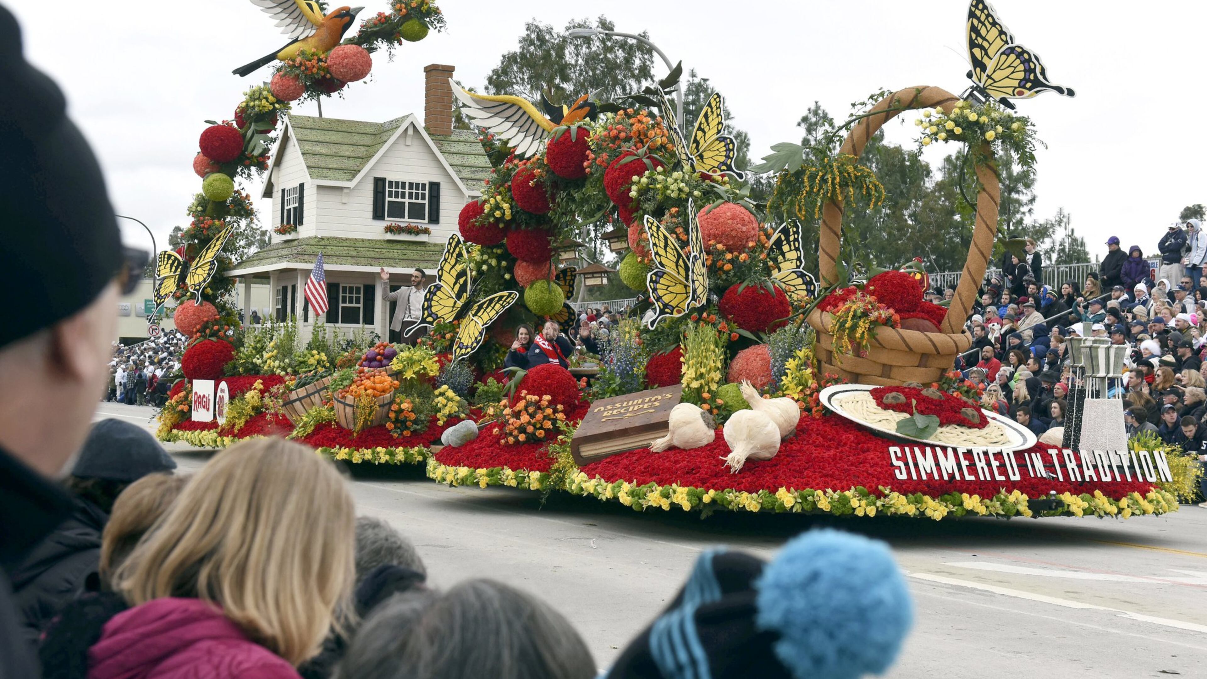 The RAGU Pasta Sauce “Simmered in Tradition” float is the most recent winner of the Rose Parade’s National Trophy for best depiction of life in the U.S.A., past, present or future. This year’s parade is scheduled to begin at 8 a.m. Jan. 1, but some streets around the parade will be closed — even to foot traffic — by 6:30 a.m. (AP Photo/Michael Owen Baker)