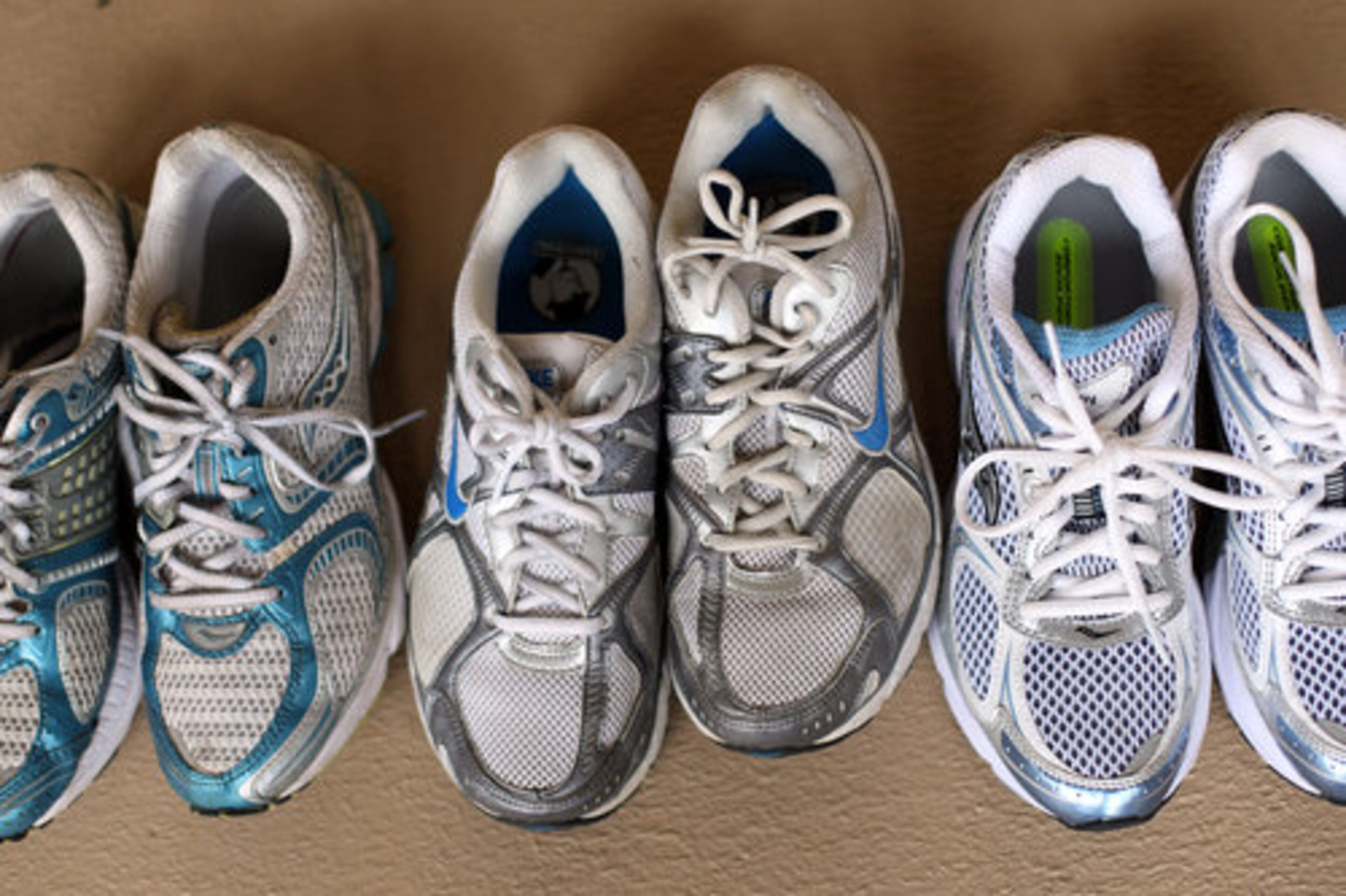 Schwartz, who is an avid runner, has a collection of Nike and Saucony tennis shoes purchased from (left to right) Big Peach Running Co., Deka Athletics and West Stride.