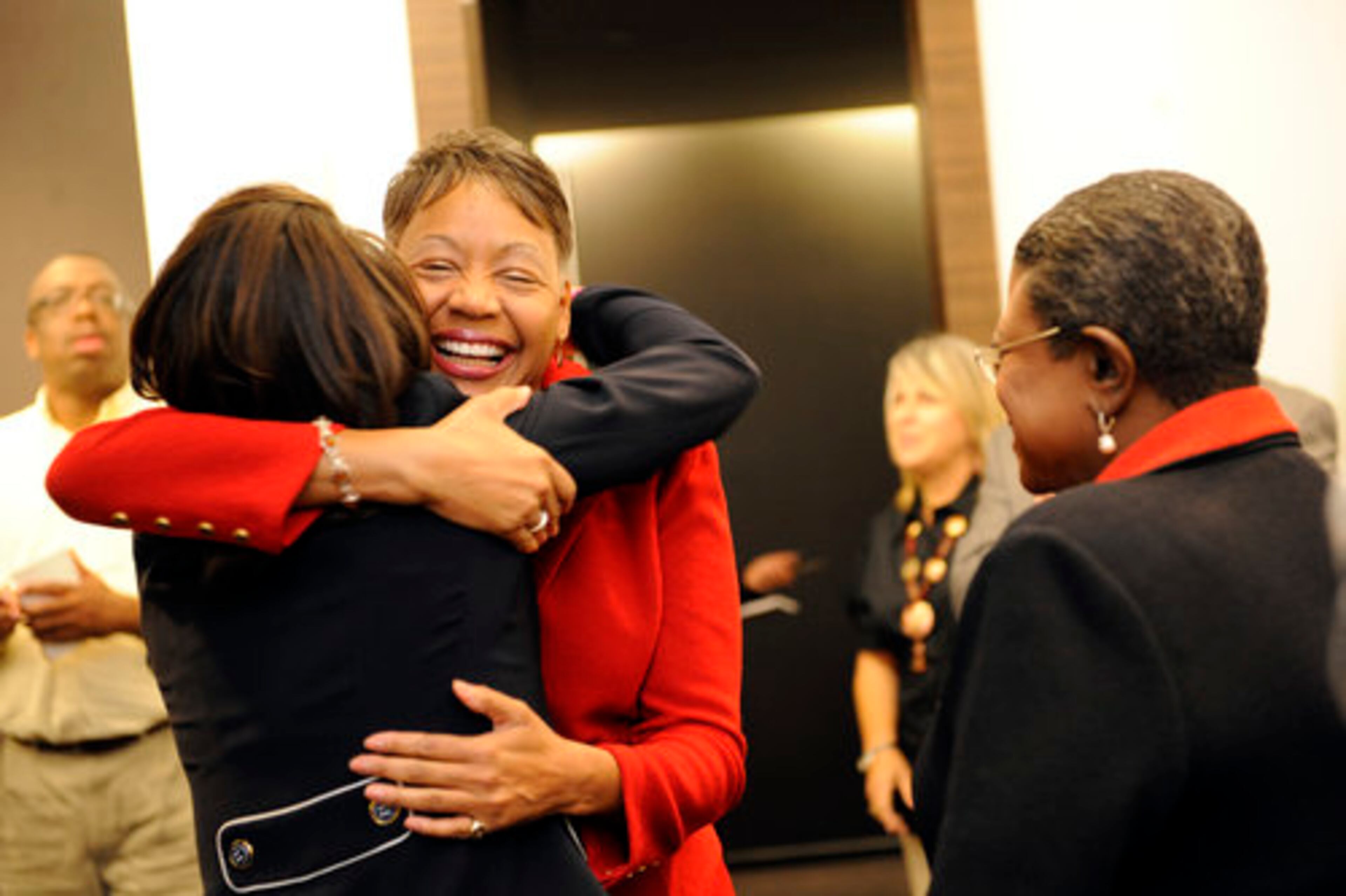 Borders greets donors before she meets with other guests at her party.