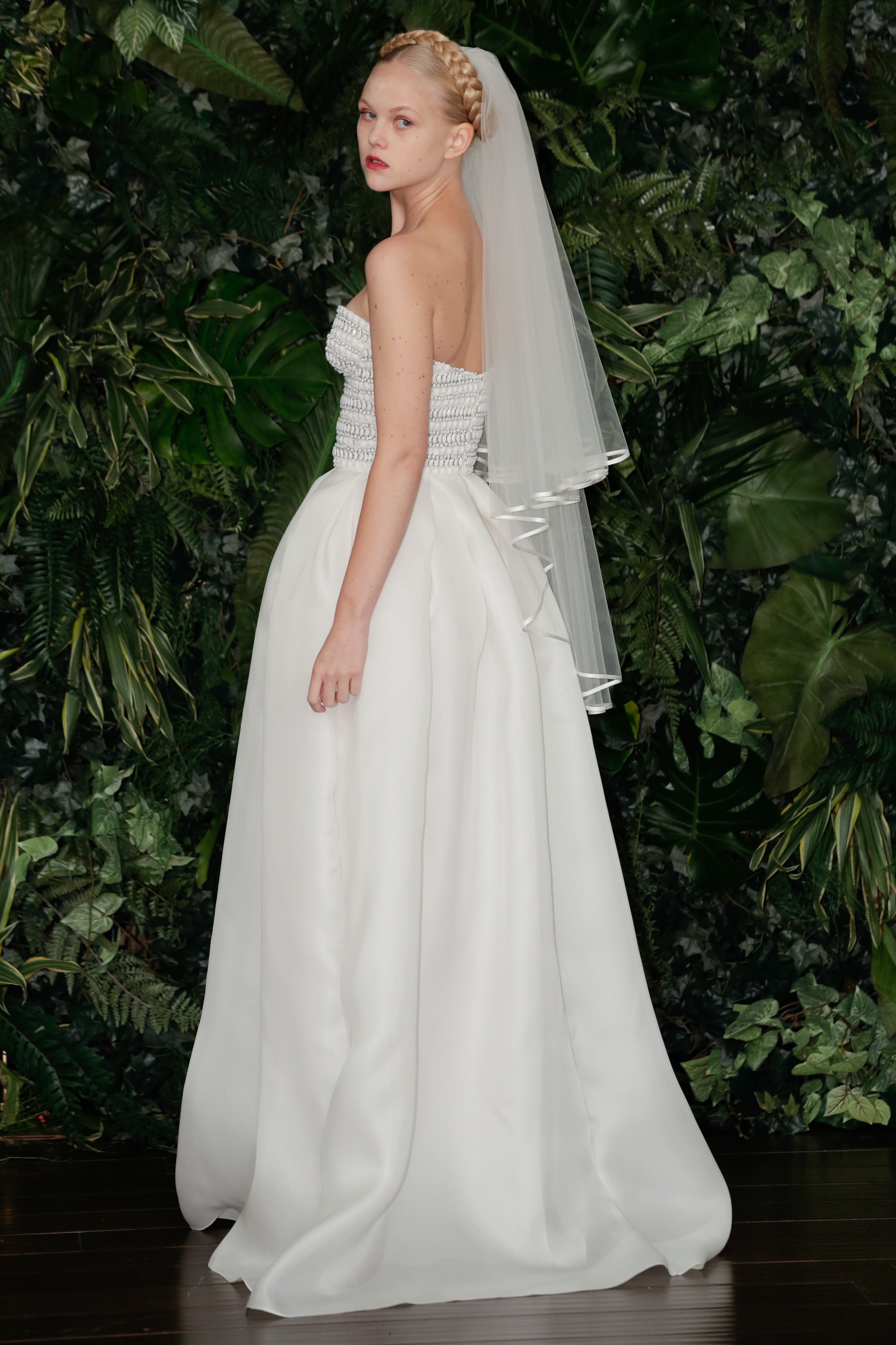 A model poses during the Naeem Khan Fall/Winter 2014 Bridal Collection presentation and reception on Oct. 12, 2013, in New York City.