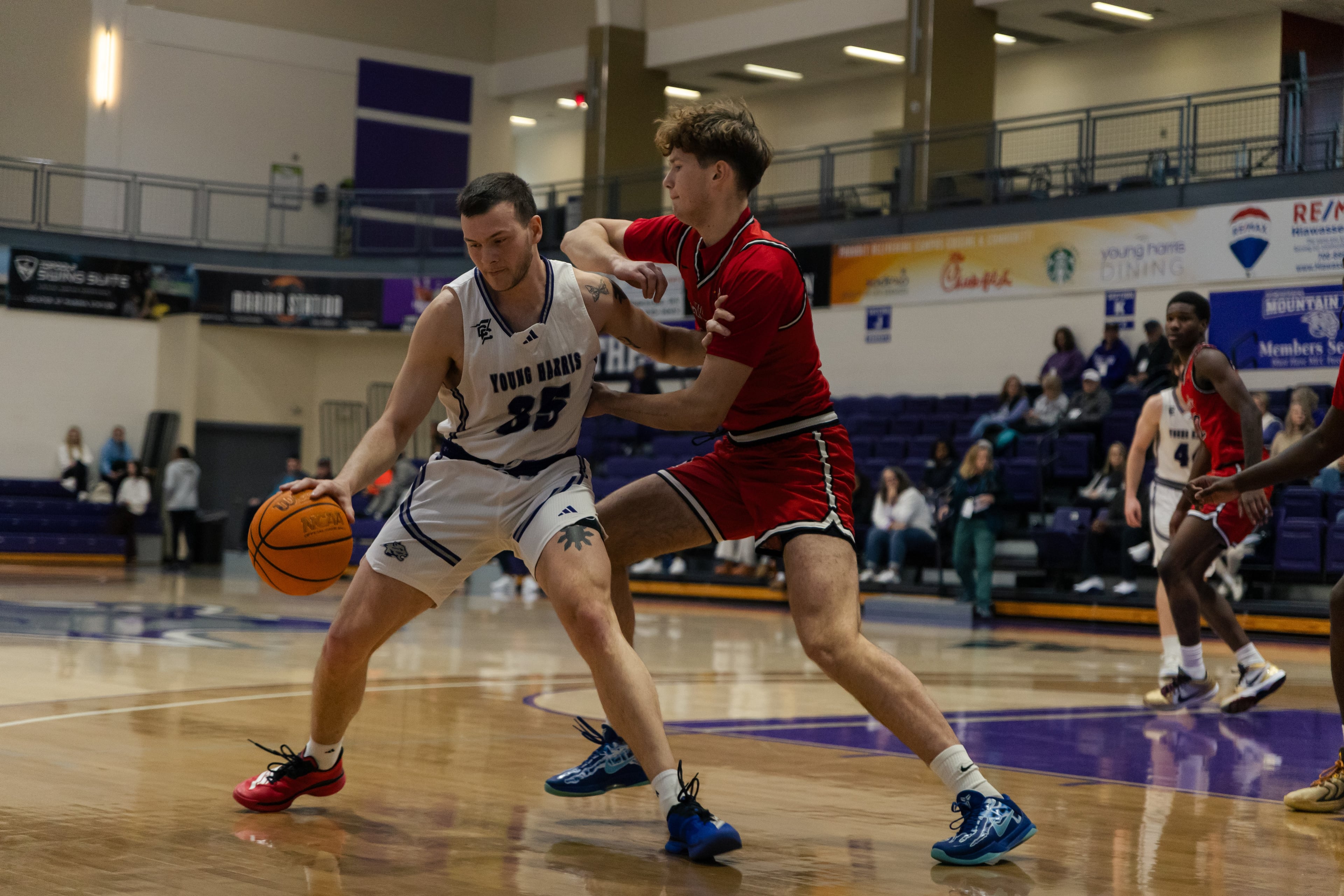Carl Cleveland (left) will be honored at Young Harris’ basketball game on Saturday for becoming the school’s all-time leading scorer. (Courtesy of Curtis Markham)