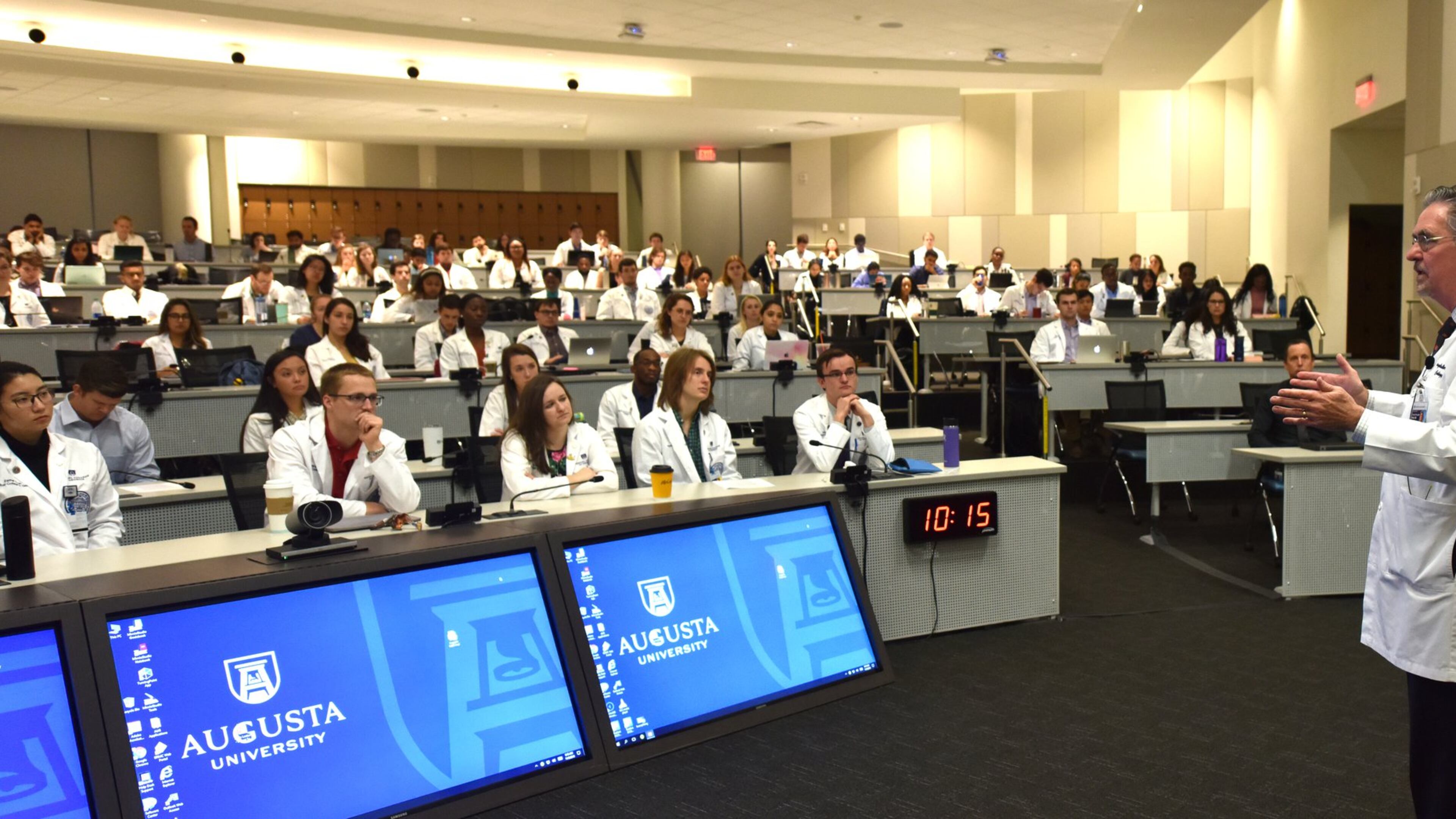 Dr. D. Douglas Miller, the vice dean for academic affairs at the Medical College of Georgia, speaks to a group of students. CONTRIBUTED