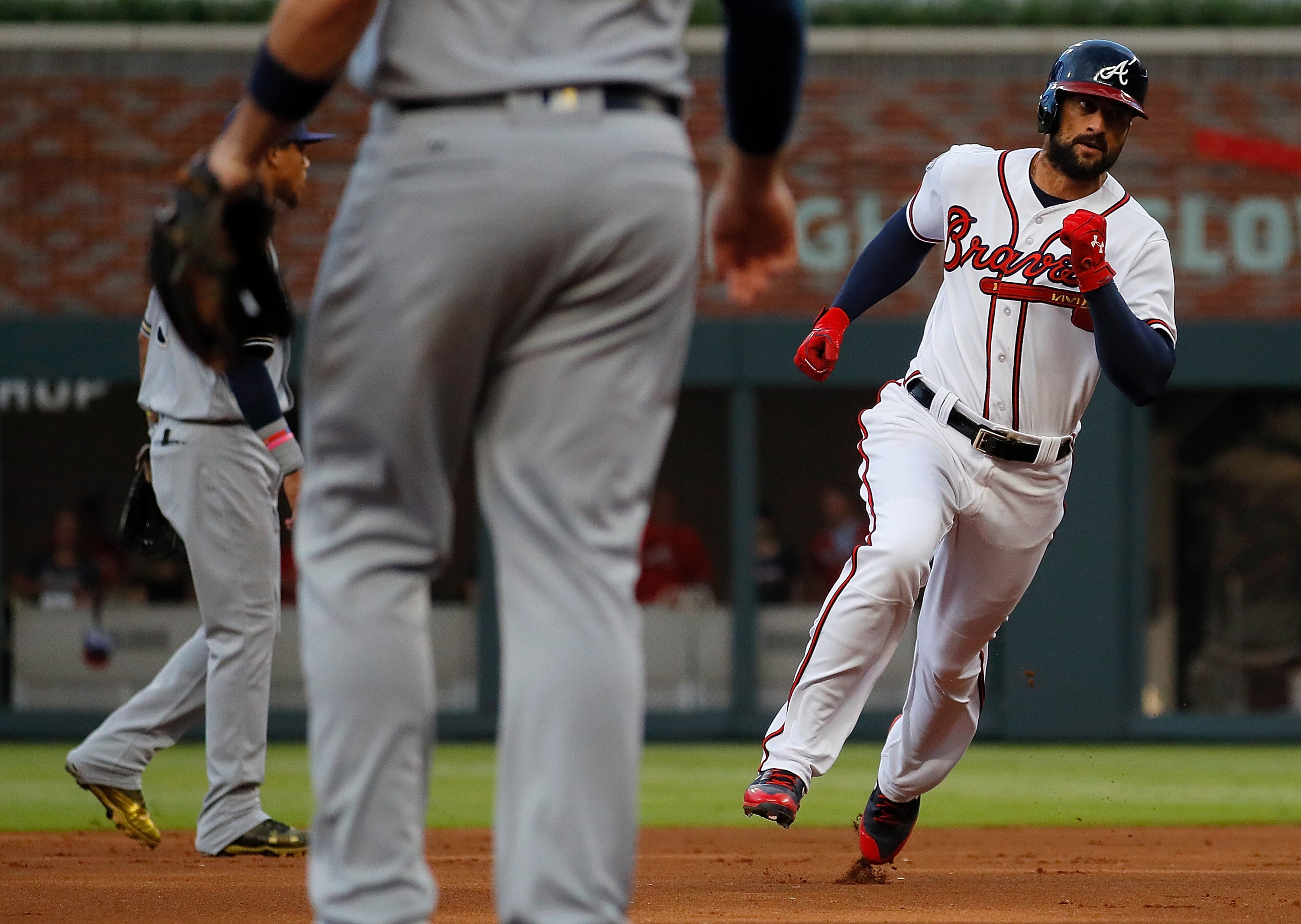 ATLANTA, GA - JUNE 23: Nick Markakis #22 of the Atlanta Braves rounds second base on a single hit by Matt Adams #18 during the first inning against the Milwaukee Brewers at SunTrust Park on June 23, 2017 in Atlanta, Georgia. (Photo by Kevin C. Cox/Getty Images)