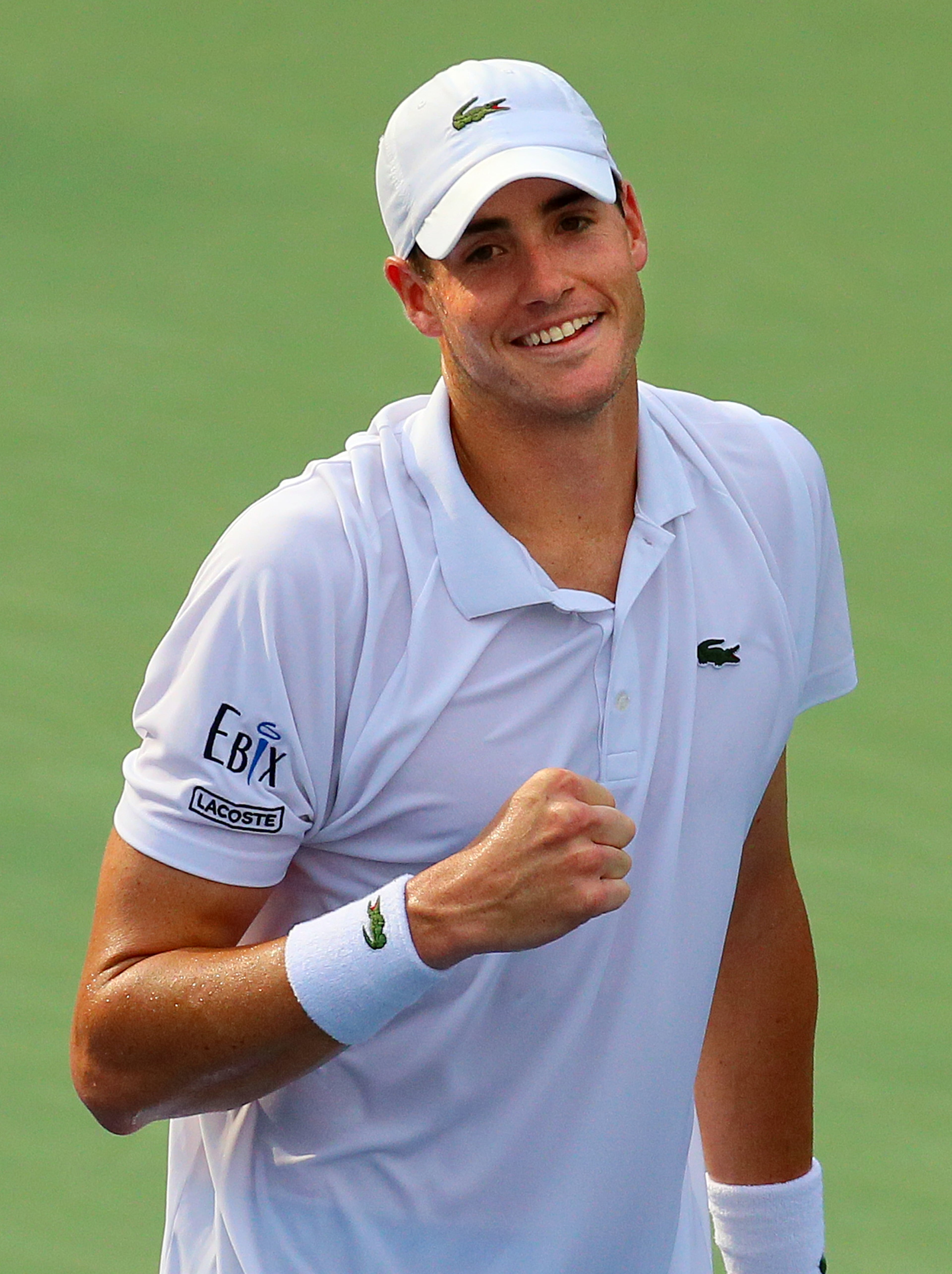 John Isner pumps his fist after defeating Kevin Anderson to win the BB&T Atlanta Open.