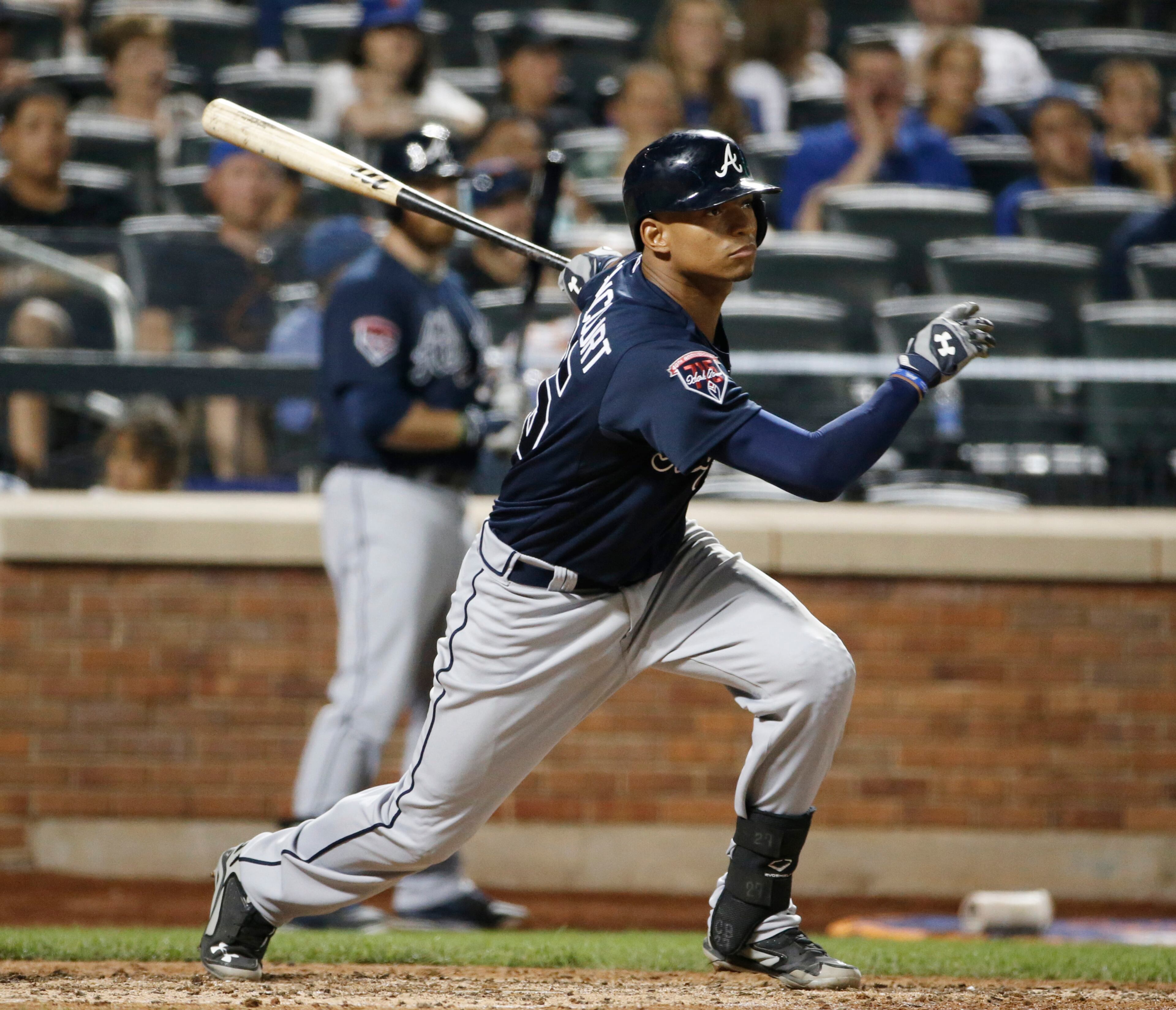 Atlanta Braves catcher Christian Bethancourt hits an eighth-inning RBI single that scored the Braves Chris Johson in a baseball game in New York, Monday, July 7, 2014. (AP Photo/Kathy Willens)