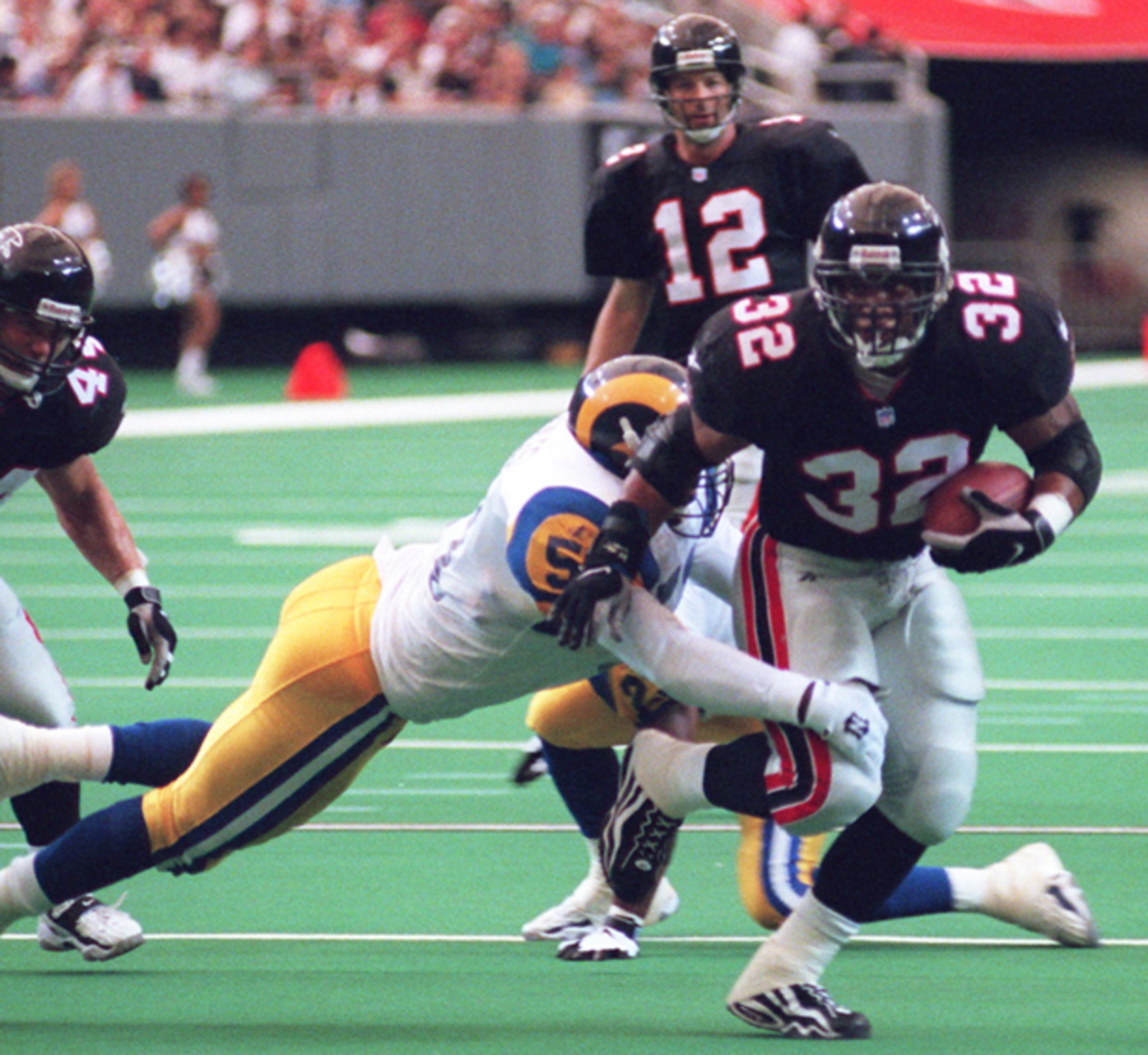 Jamal Anderson ran for 172 yards and 2 touchdowns as Atlanta marched over division rival St. Louis 37-15 at the Georgia Dome. Chris Chandler was 12-for-26 with 236 yards with 2 touchdowns and 1 interception, which was run back for a touchdown.