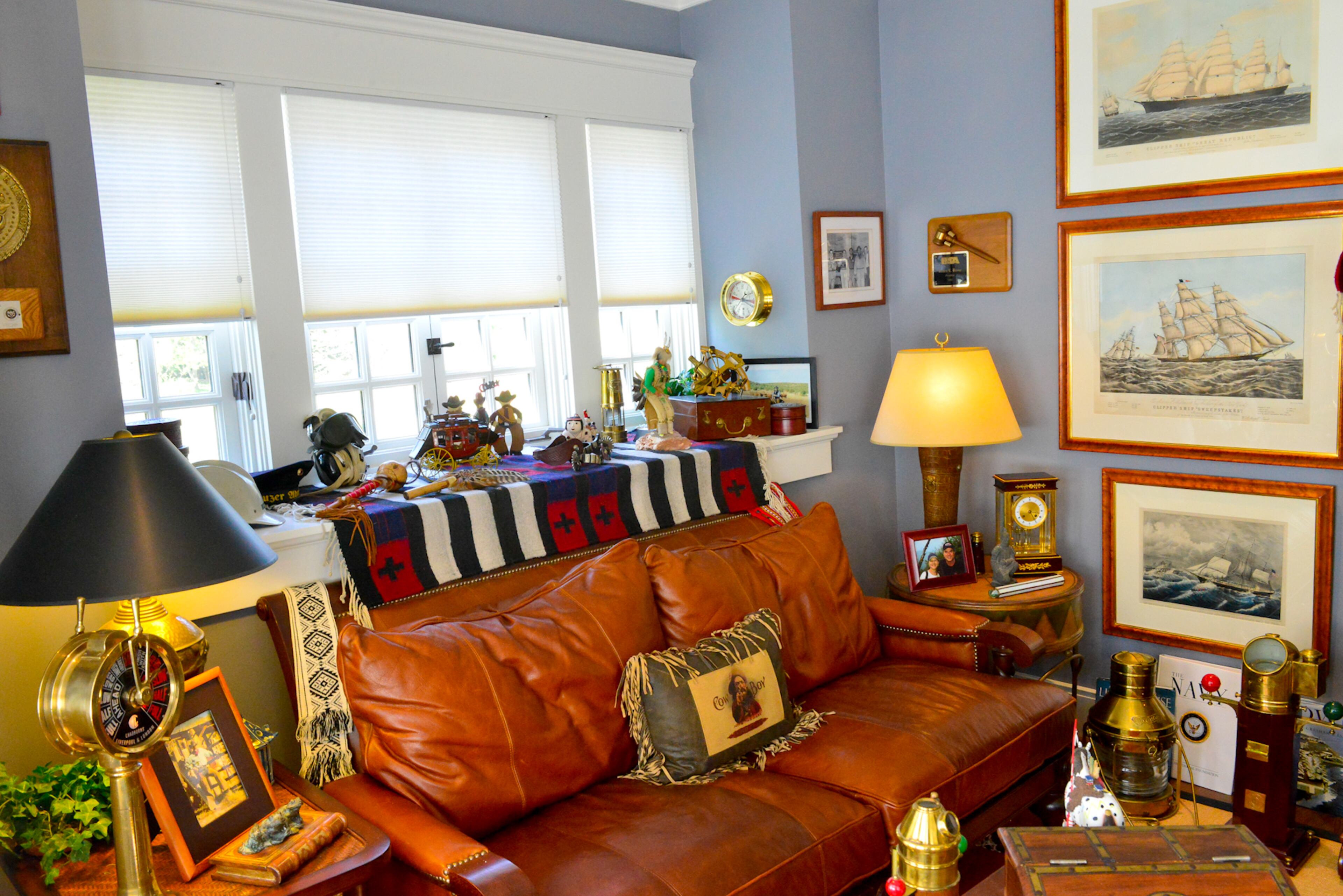 Navajo blankets, runners and rugs anchor the home office, which is filled with maritime and other collectibles, including Steinbach German nutcrackers on the ledge.