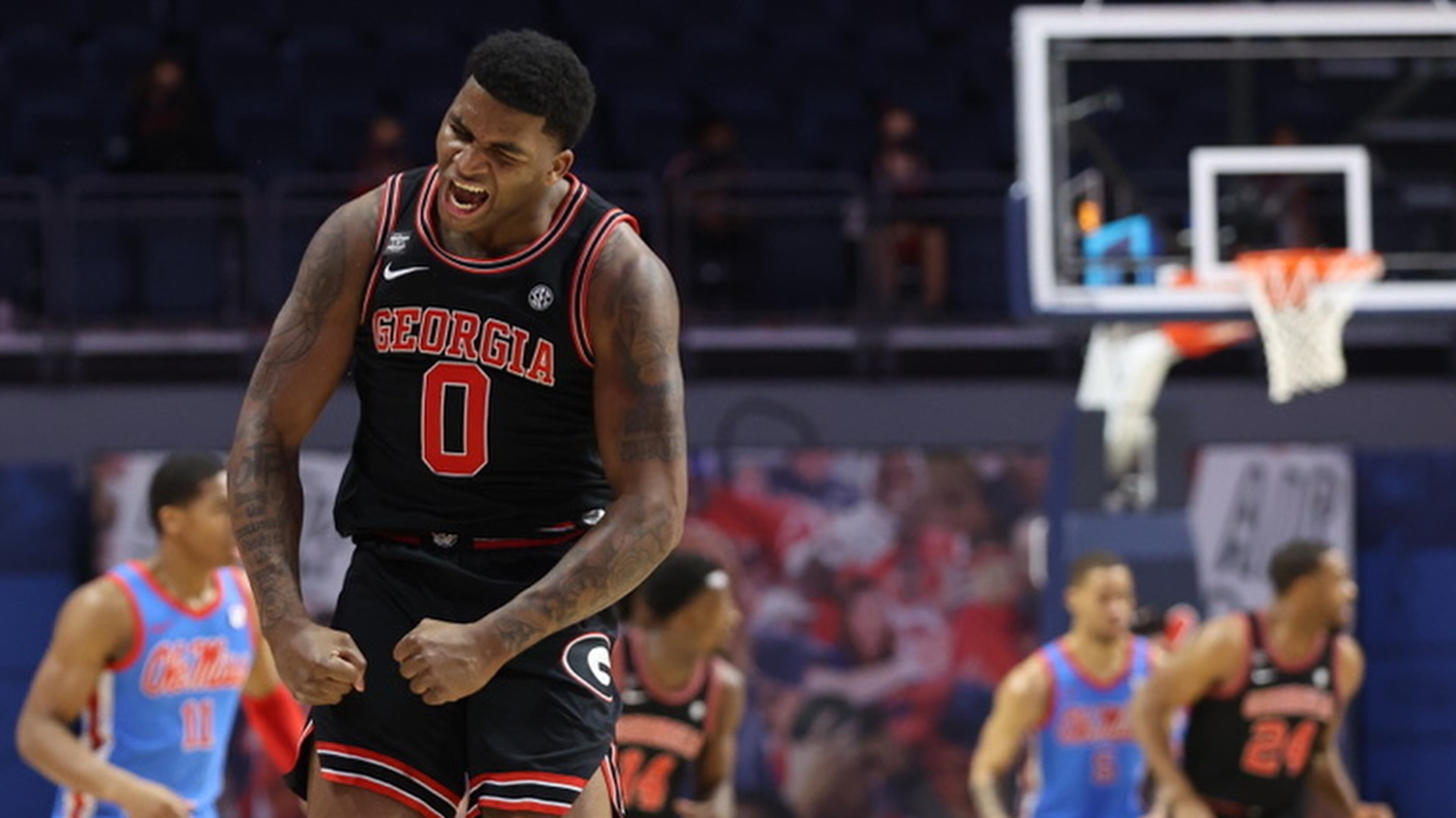 Georgia basketball player K.D. Johnson (0) celebrates during game against Ole Miss Jan. 16, 2021, in Oxford, Miss. (Joshua McCoy/Ole Miss Athletics)