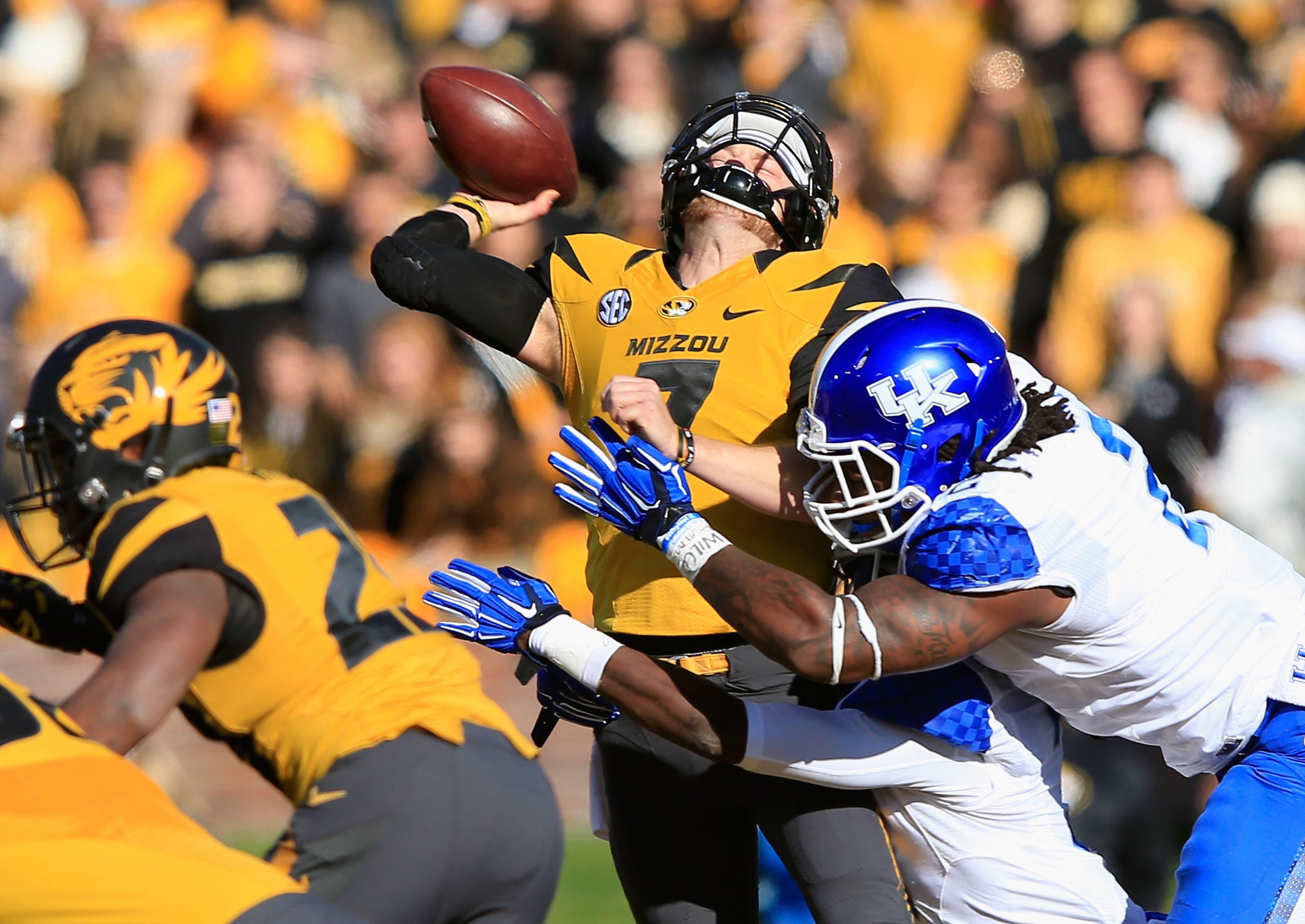 Bud Dupree, Kentucky. Here Dupree puts a hard hit on QB Maty Mauk of Missouri as Mauk releases the ball last November. (Photo by Jamie Squire/Getty Images)