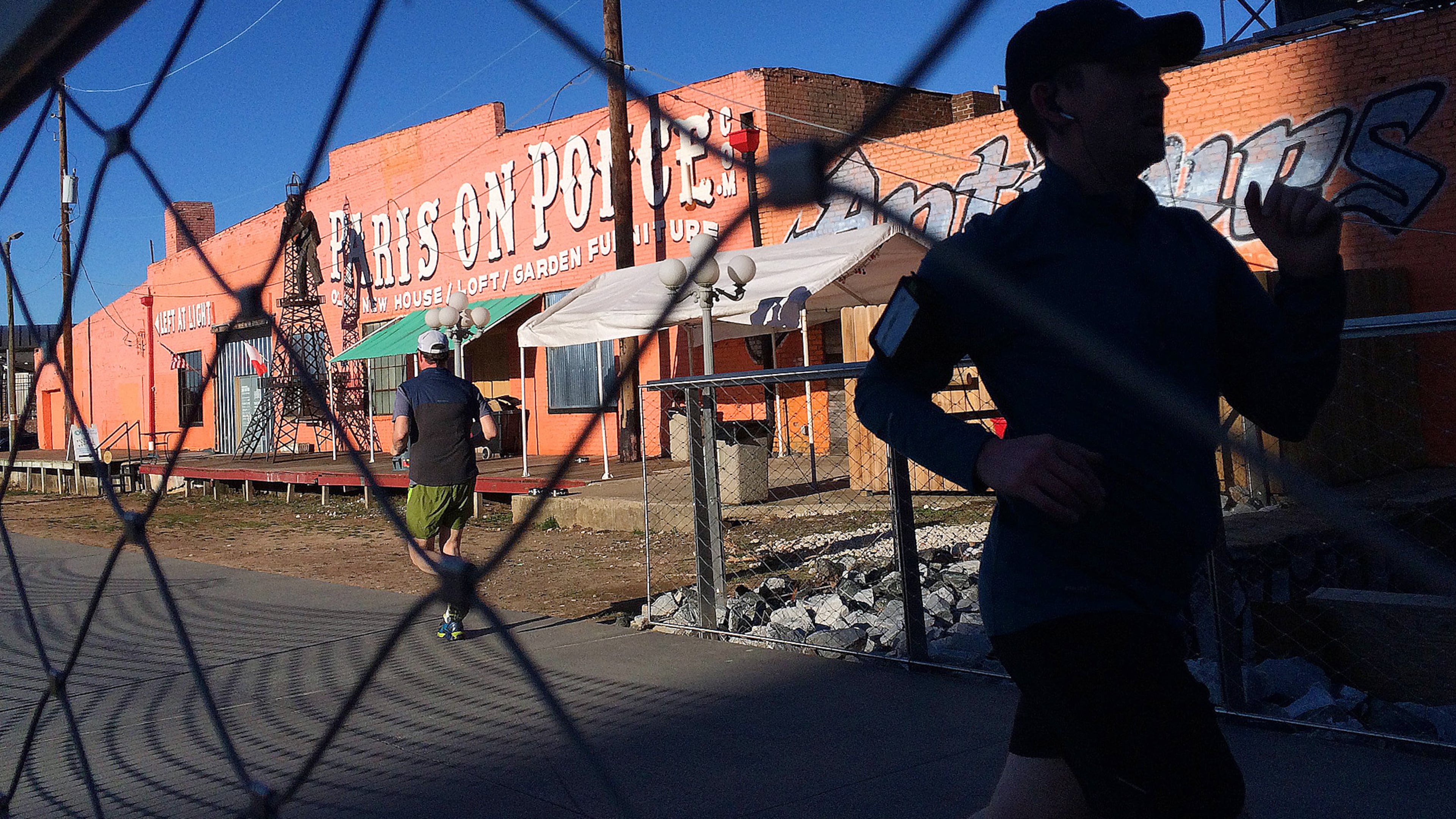 February 21, 2014 Atlanta: Runners make their way past Paris On Ponce as they use the Atlanta Beltline's Eastside Trail late Friday afternoon Febuary 21, 2014. BEN GRAY / BGRAY@AJC.COM