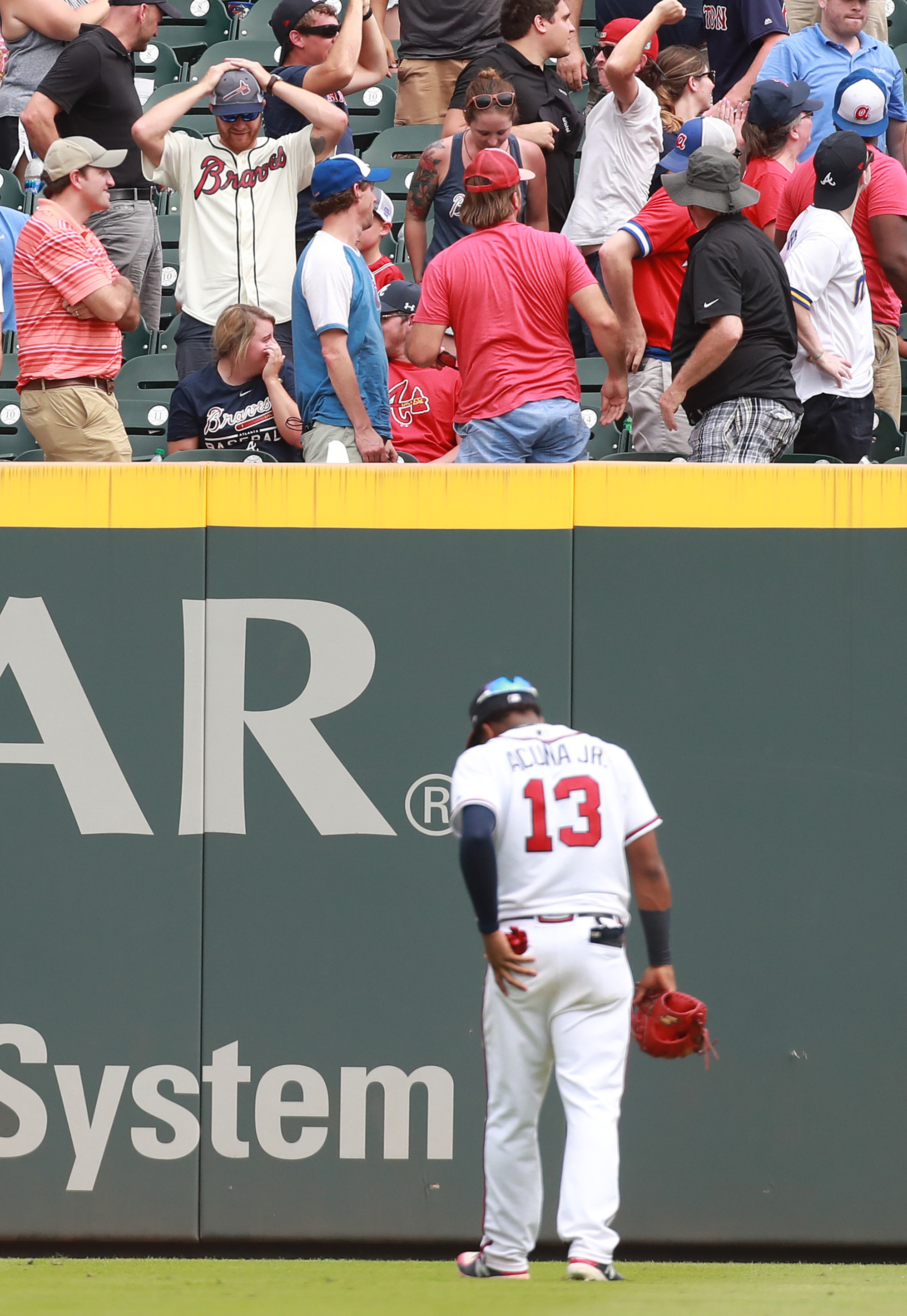 September 5, 2018 Atlanta: Atlanta Braves Ronald Acuna Jr. reacts t not being able to get to Boston Red Sox Brandon Phillips' 2-run homer to beat the Atlanta Braves 9-8 during the 9th inning in a MLB baseball game on Wednesday, Sept 5, 2018, in Atlanta. Curtis Compton/ccompton@ajc.com