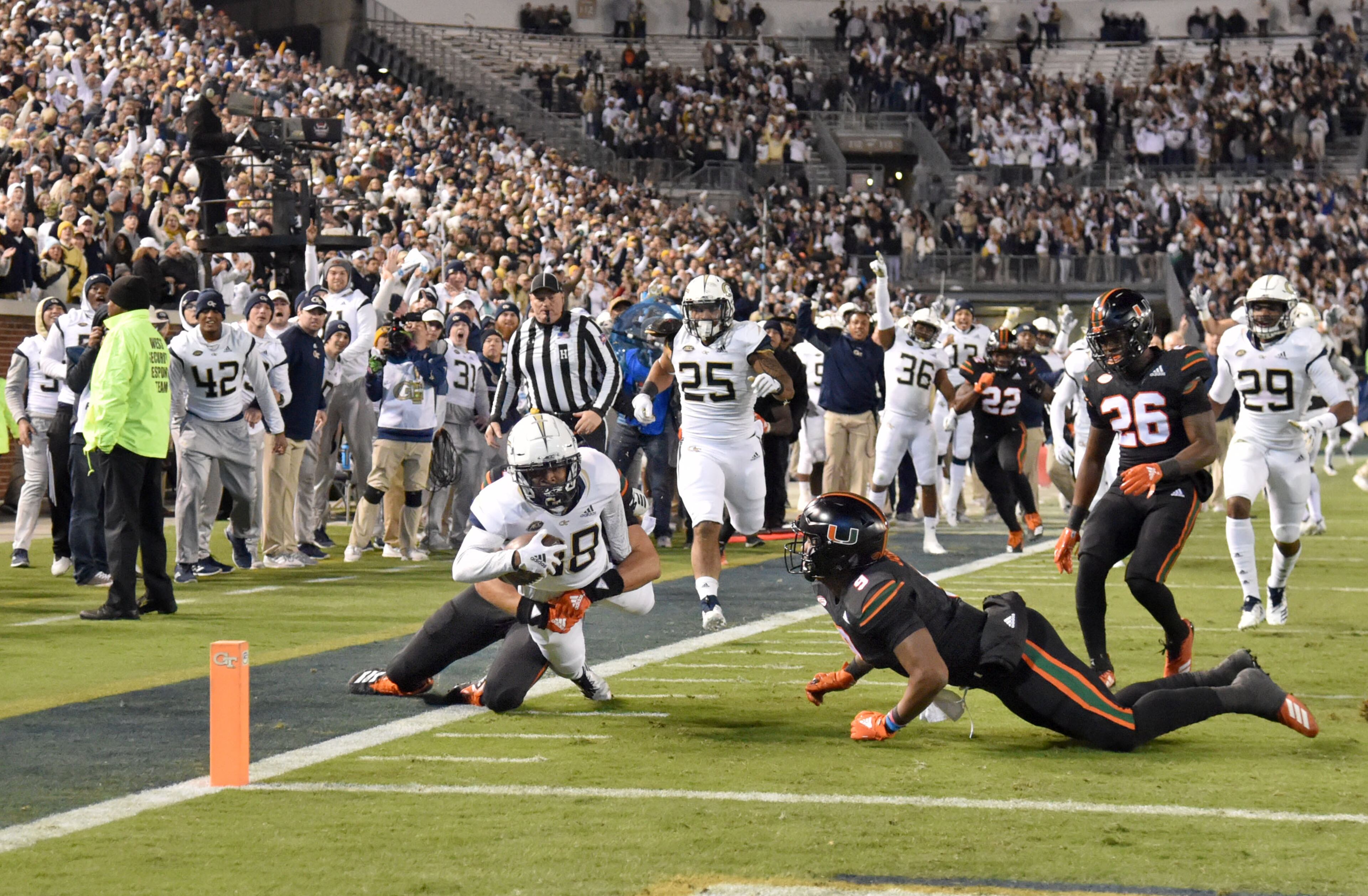 November 10, 2018 Atlanta - Georgia Tech defensive back Ajani Kerr (38) runs after he picked up a fumble in the first half at Bobby Dodd Stadium on Saturday, November 10, 2018. HYOSUB SHIN / HSHIN@AJC.COM