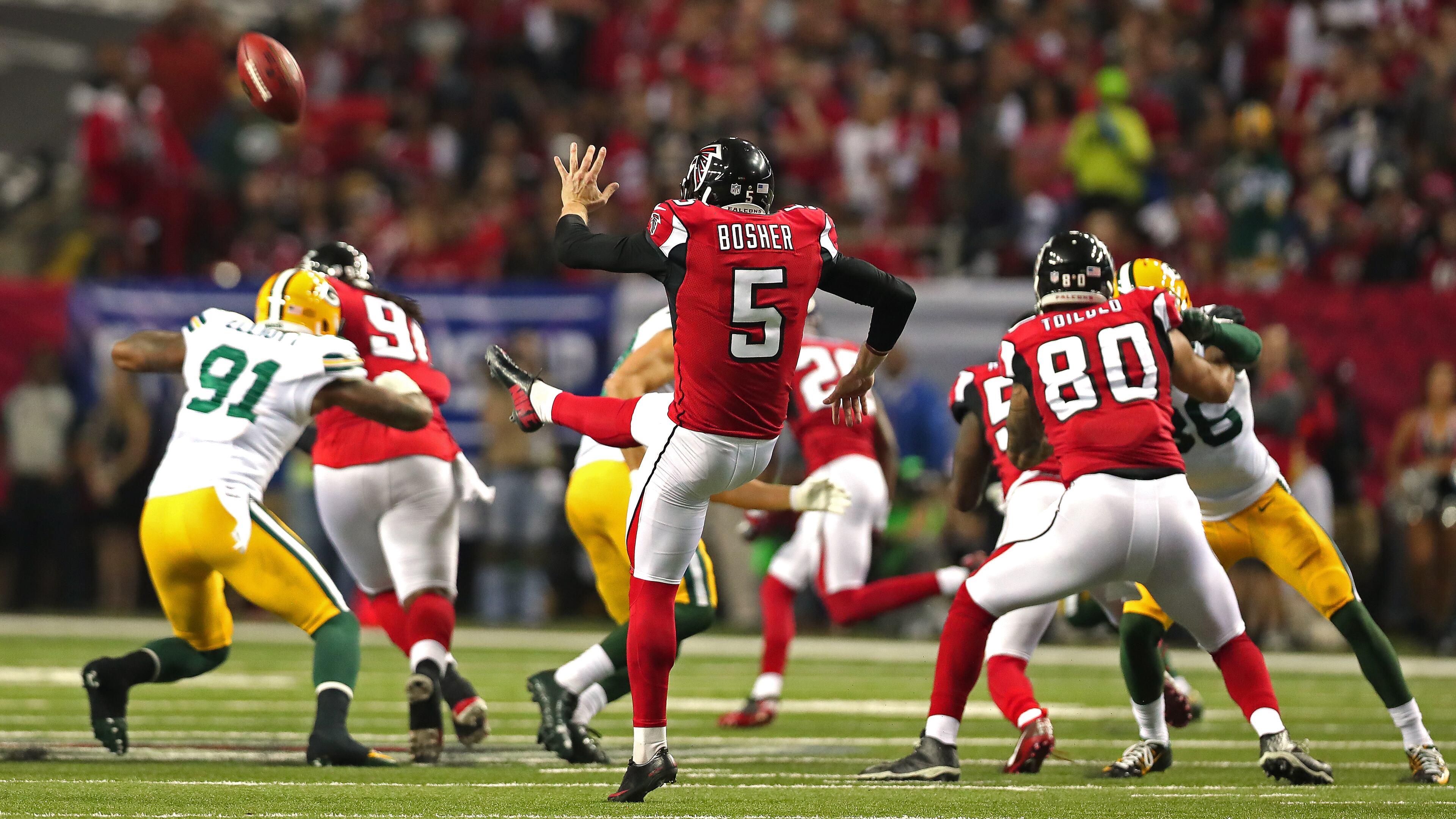 ATLANTA, GA - JANUARY 22: Matt Bosher #5 of the Atlanta Falcons punts the ball off to the Green Bay Packers during the first quarter in the NFC Championship Game at the Georgia Dome on January 22, 2017 in Atlanta, Georgia. (Photo by Tom Pennington/Getty Images)