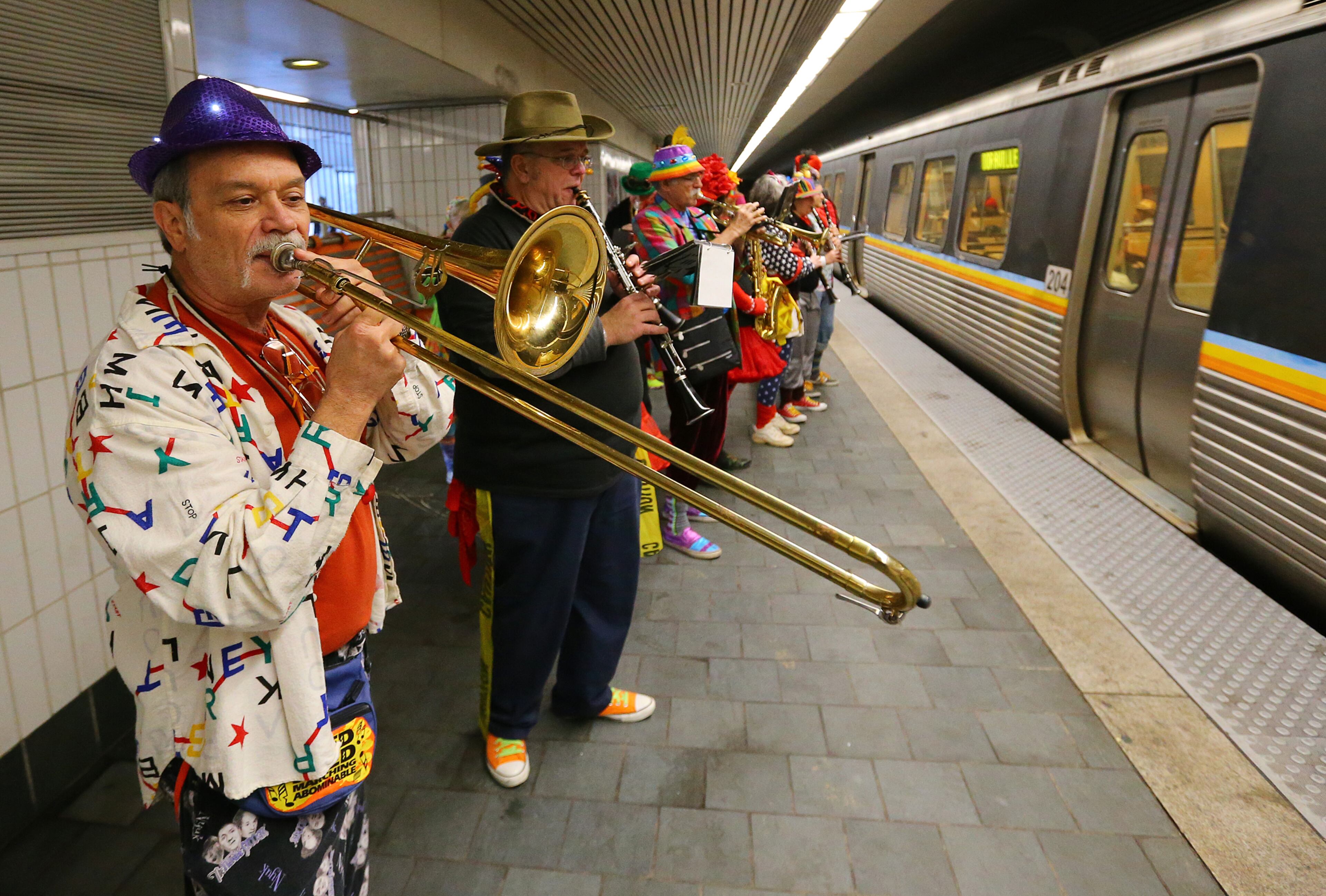 Charles Bohanan (left) and other members of the Seed and Feed Marching Abominable band provide some tunes during the No Pants Subway Ride Atlanta 2014 event on MARTA. CURTIS COMPTON / CCOMPTON@AJC.COM