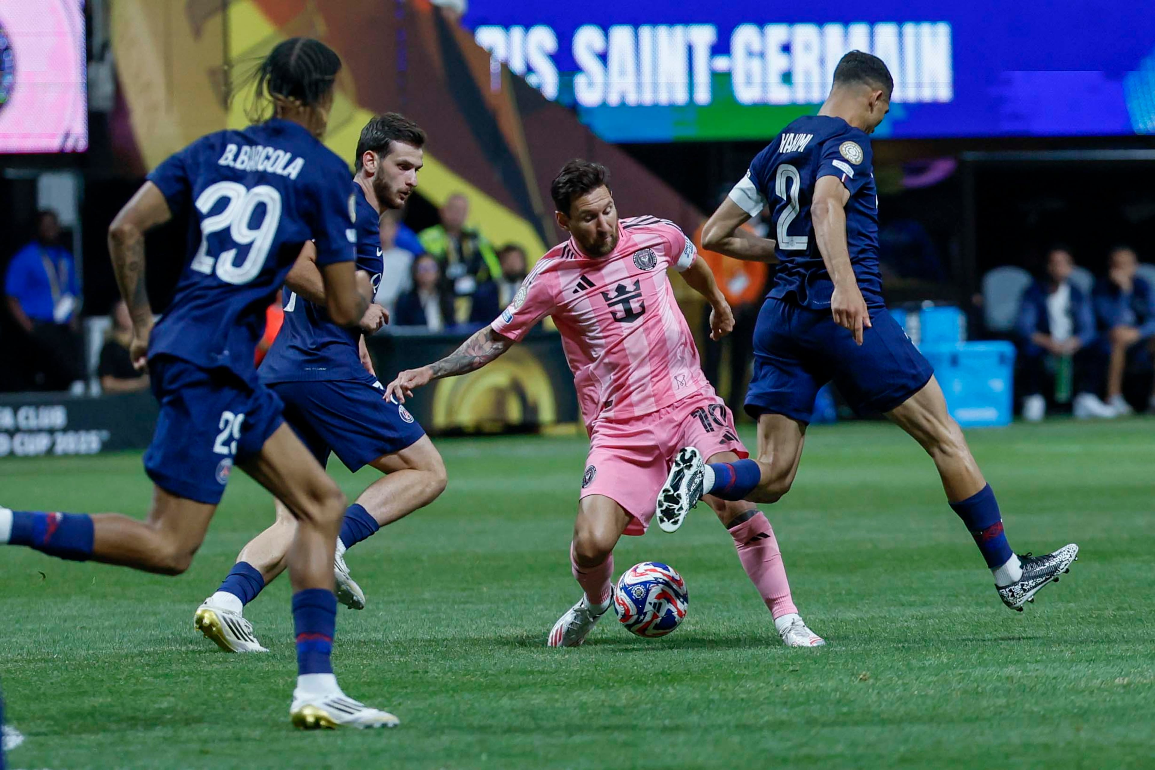 Inter Miami forward Lionel Messi (10) dribbles between PSG defenders during the Club World Cup round of 16 soccer match between Paris Saint-Germain FC and Inter Miami in Atlanta, Georgia, on Sunday, June 29, 2025.
(Miguel Martinez/ AJC)