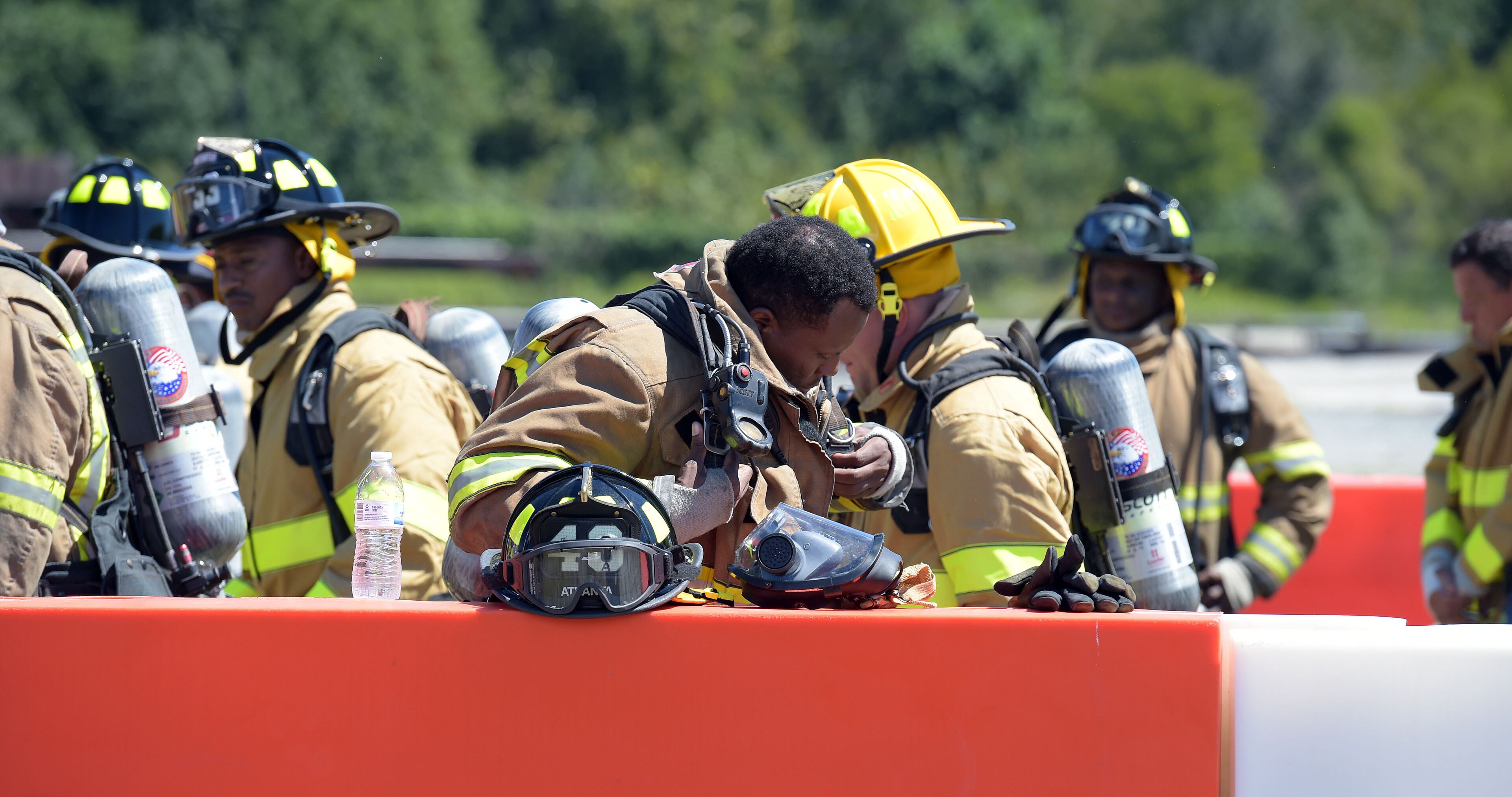 SEPTEMBER 14, 2015 ATLANTA Atlanta Fire Rescue Department firefighters hosted live fire training for attendees at the Aircraft Rescue Fire Fighting (ARFF) Conference, Monday, September, 14, 2015. Firefighters from across the world, battled a simulated fire in an engine and landing gear and also a cascade fire with wing and fuel tanks. Firefighters were Atlanta this week for the 26th Annual ARFF Working Group Conference and Educational Symposium. One of the highlights of the conference was the live fire training at the Hartsfield-Jackson firefighter training site. KENT D. JOHNSON/KDJOHNSON@AJC.COM