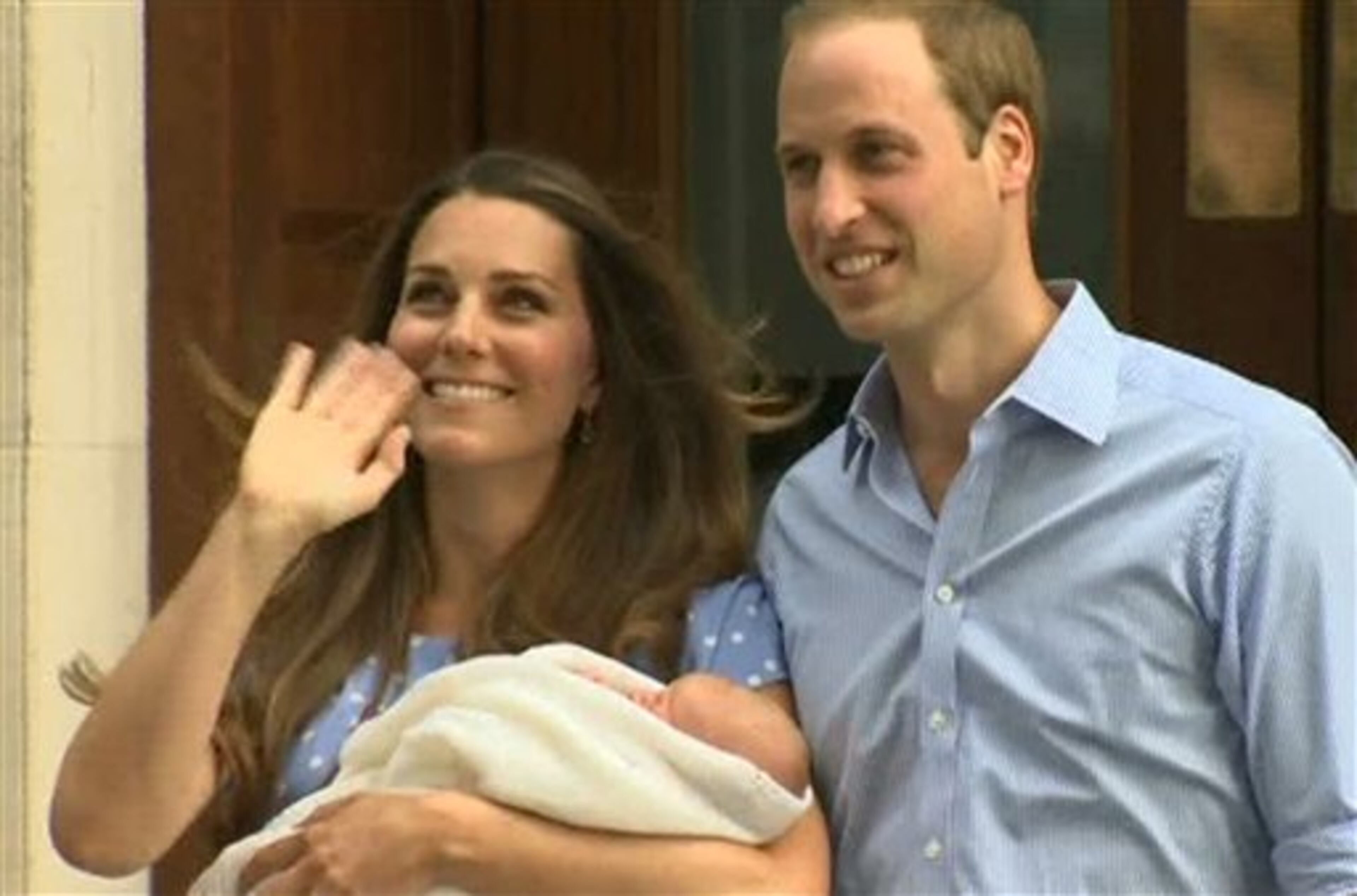 In this image from video, The Duke and Duchess of Cambridge leave the Lindo Wing of St Mary's Hospital in London Tuesday July 23 2013, carrying their new-born son, the Prince of Cambridge who was born Monday, into public view for the first time. The boy will be third in line to the British throne. (AP Photo/APTN)