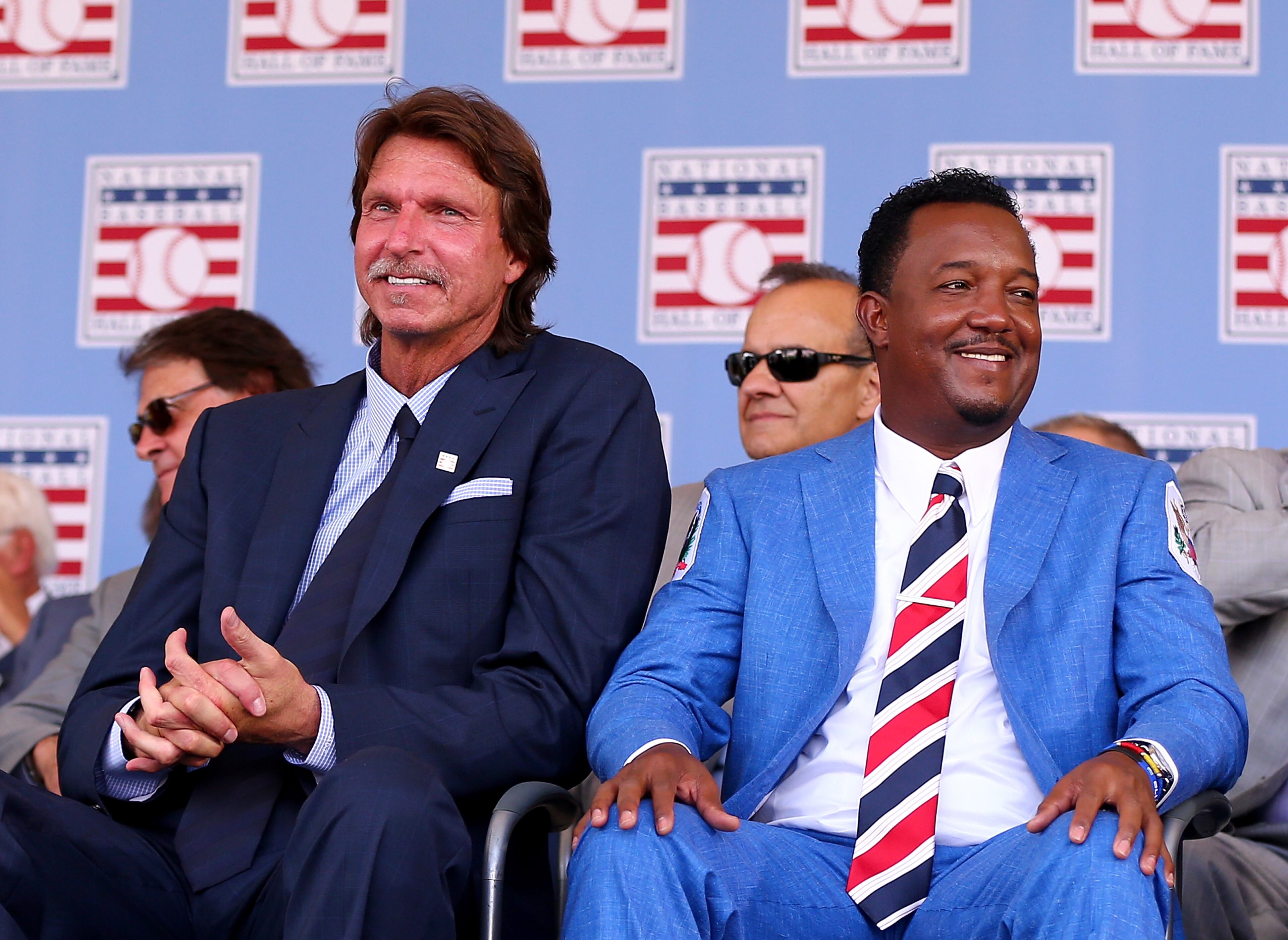 COOPERSTOWN, NY - JULY 26: Randy Johnson and Pedro Martinez sit as the Hall of Fame Induction Ceremony begins at National Baseball Hall of Fame on July 26, 2015 in Cooperstown, New York.Johnson was inducted with Pedro Martinez;Craig Biggio and John Smoltz (Photo by Elsa/Getty Images)