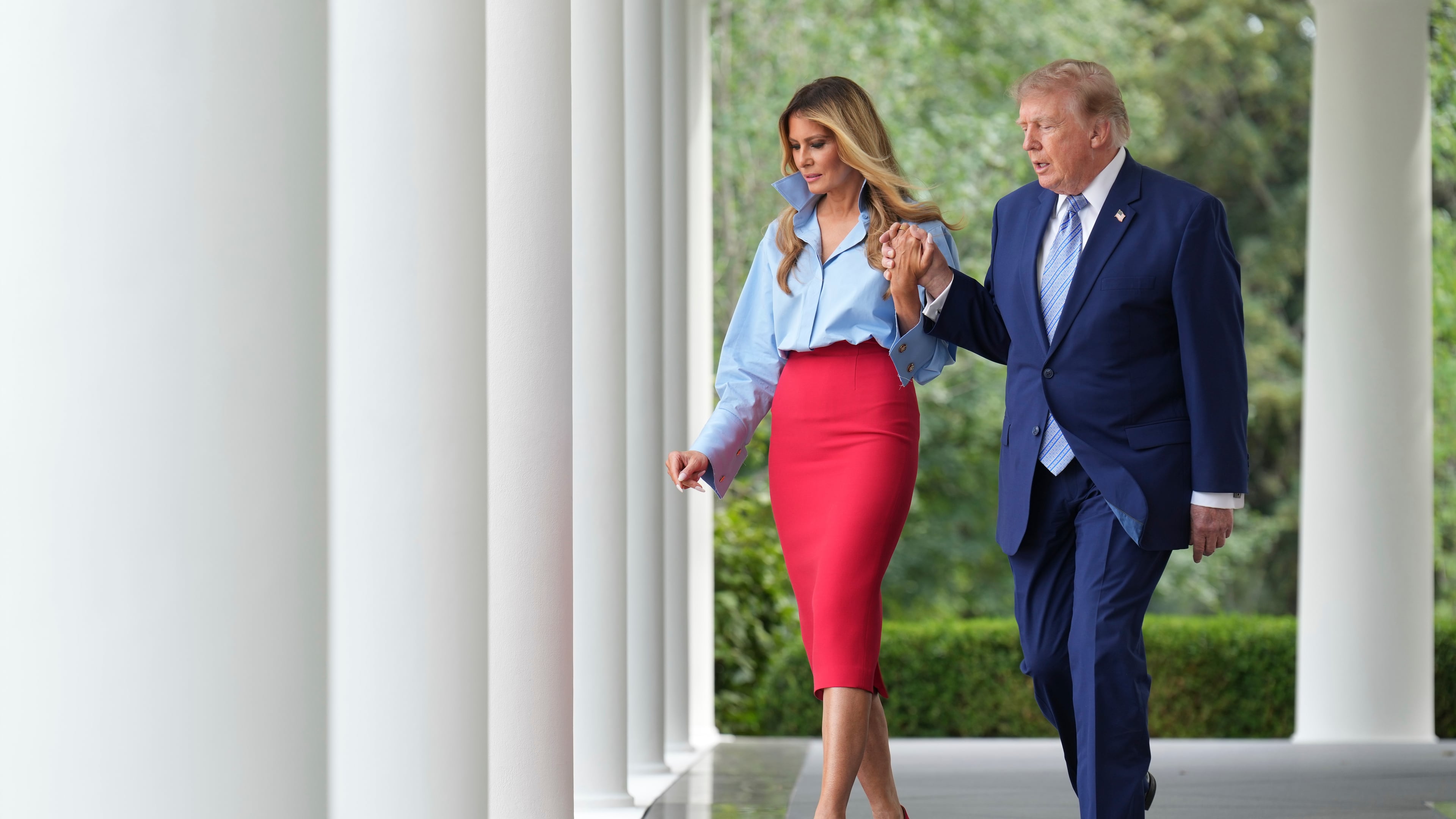 President Donald Trump, right, and first lady Melania Trump walk to attend an event in the Rose Garden of the White House, Thursday, Aug. 20, 2026, in Washington. (AP Photo/Jacquelyn Martin)