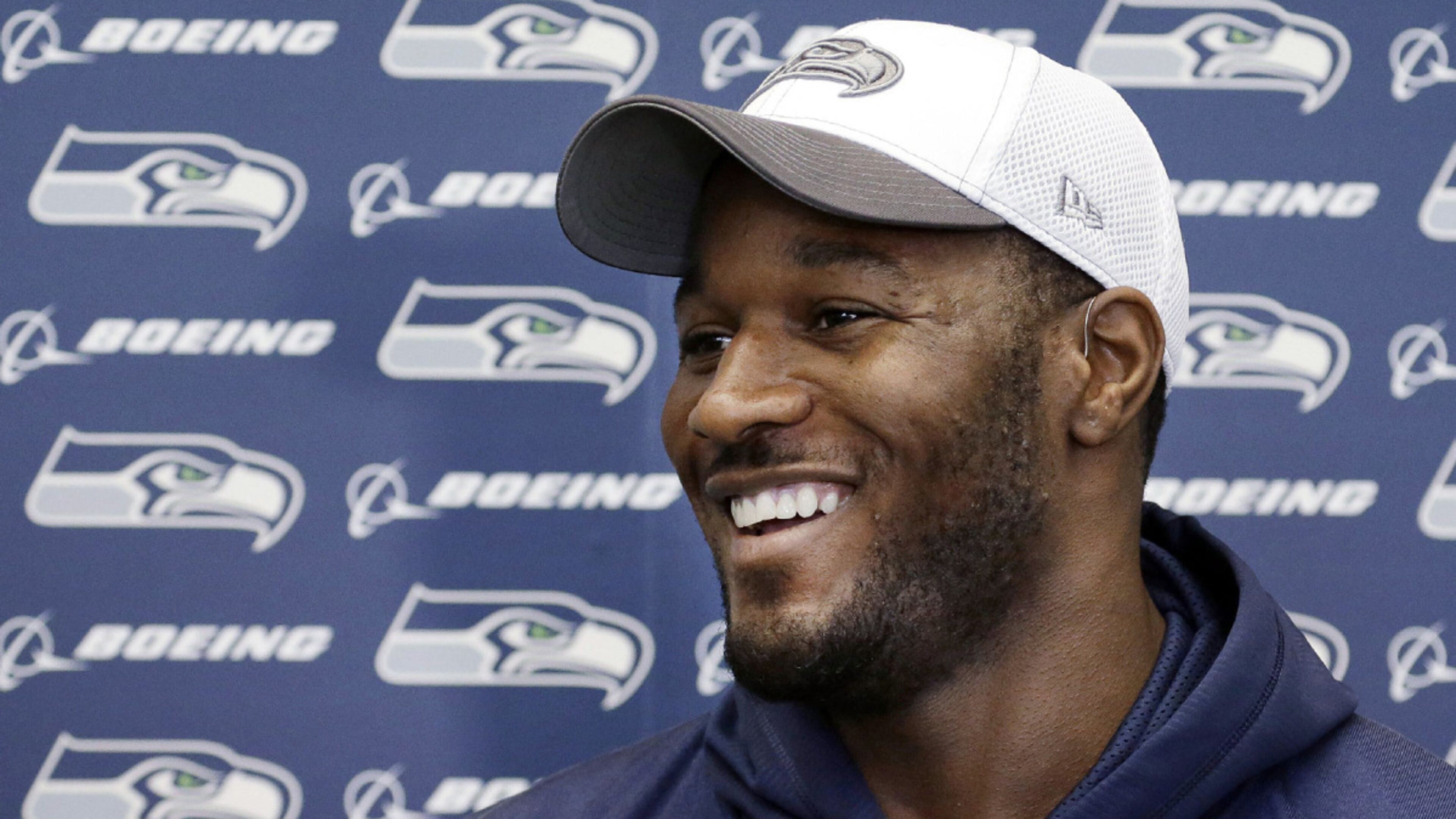 Seattle Seahawks’ Derrick Coleman speaks with reporters before NFL football practice Thursday, Jan. 16, 2014, in Renton, Wash. The Seahawks play the San Francisco 49ers on Sunday in the NFC championship game. (AP Photo/Elaine Thompson)