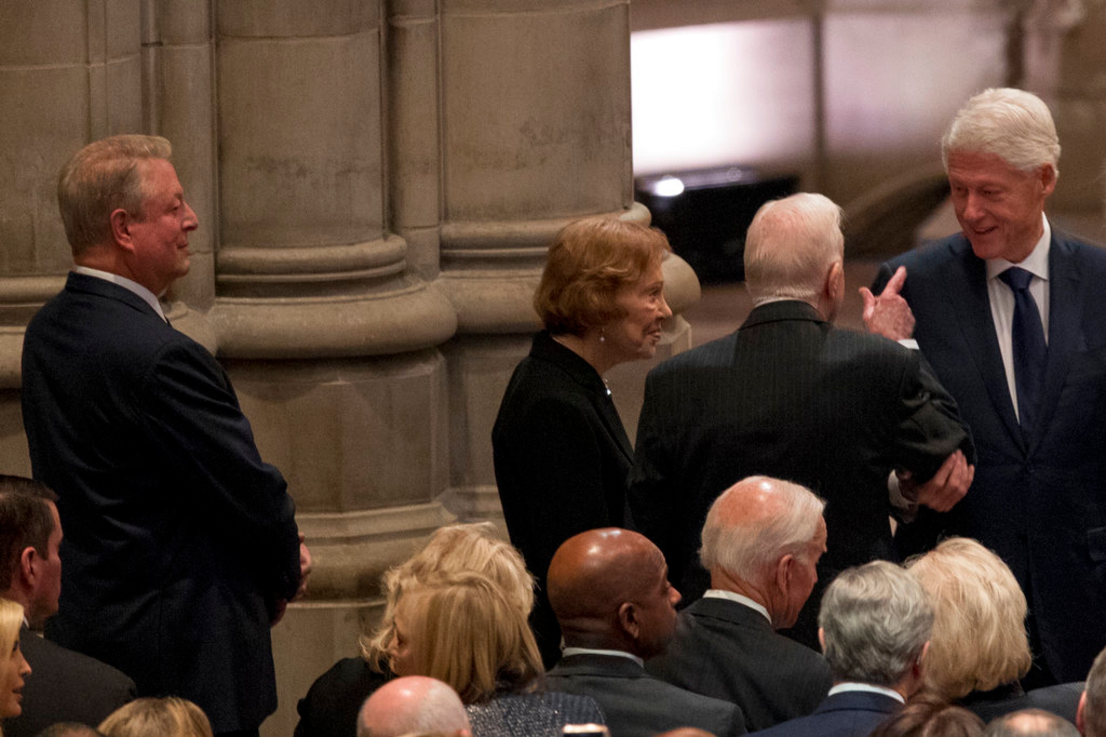 Former Vice President Al Gore, left, looks on as former President Jimmy Carter, second from right, and former first lady Rosalynn Carter, third from right, speaks with former President Bill Clinton, right, before a State Funeral for former President George H.W. Bush at the National Cathedral, Wednesday, Dec. 5, 2018, in Washington. (AP Photo/Andrew Harnik, Pool)