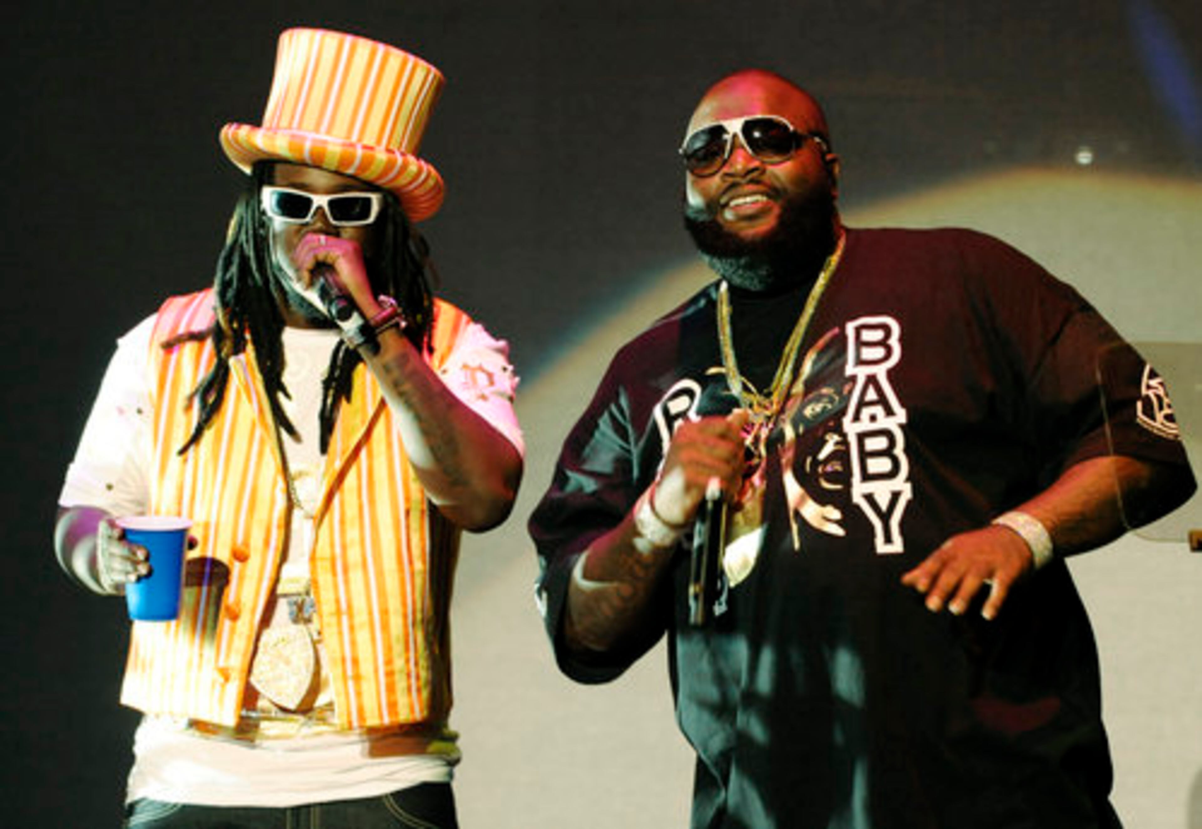 T-Pain (left) and Rick Ross perform together during the event. T-Pain felt the need to carry his beverage. (You never know when your throat will get dry.)