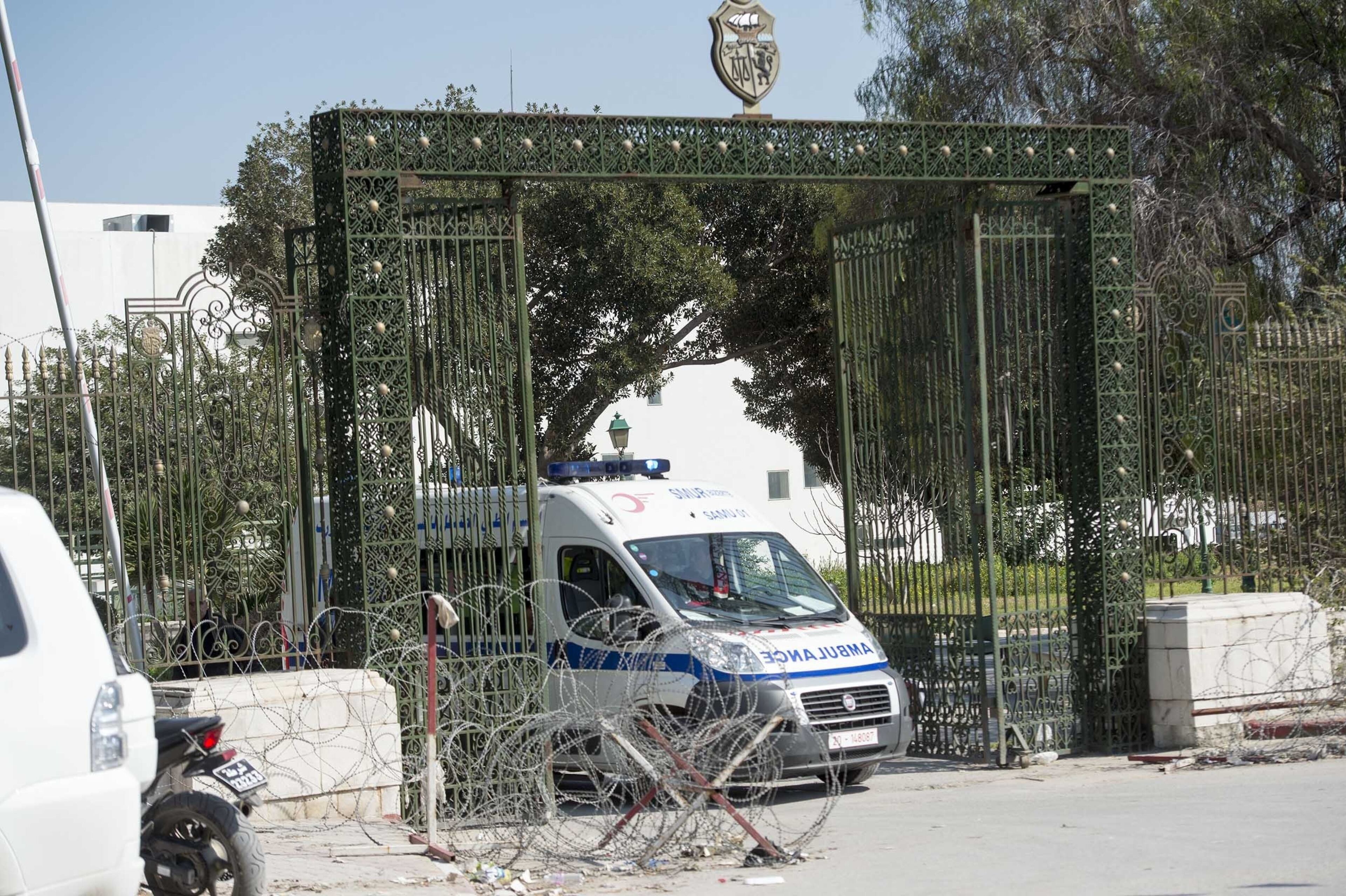 TUNIS, TUNISIA - MARCH 18: An ambulance evacuating woundeds from the National Bardo Museum, near the country's parliament in Tunis, when gunmen take an unknown number of tourists hostage on Wednesday, March 18, 2015. At least eight people, including six foreign tourists, were killed in the attack by unidentified gunmen on the museum in the Tunisian capital, the Interior Ministry said. (Photo by Ahmet Izgi/Anadolu Agency/Getty Images)