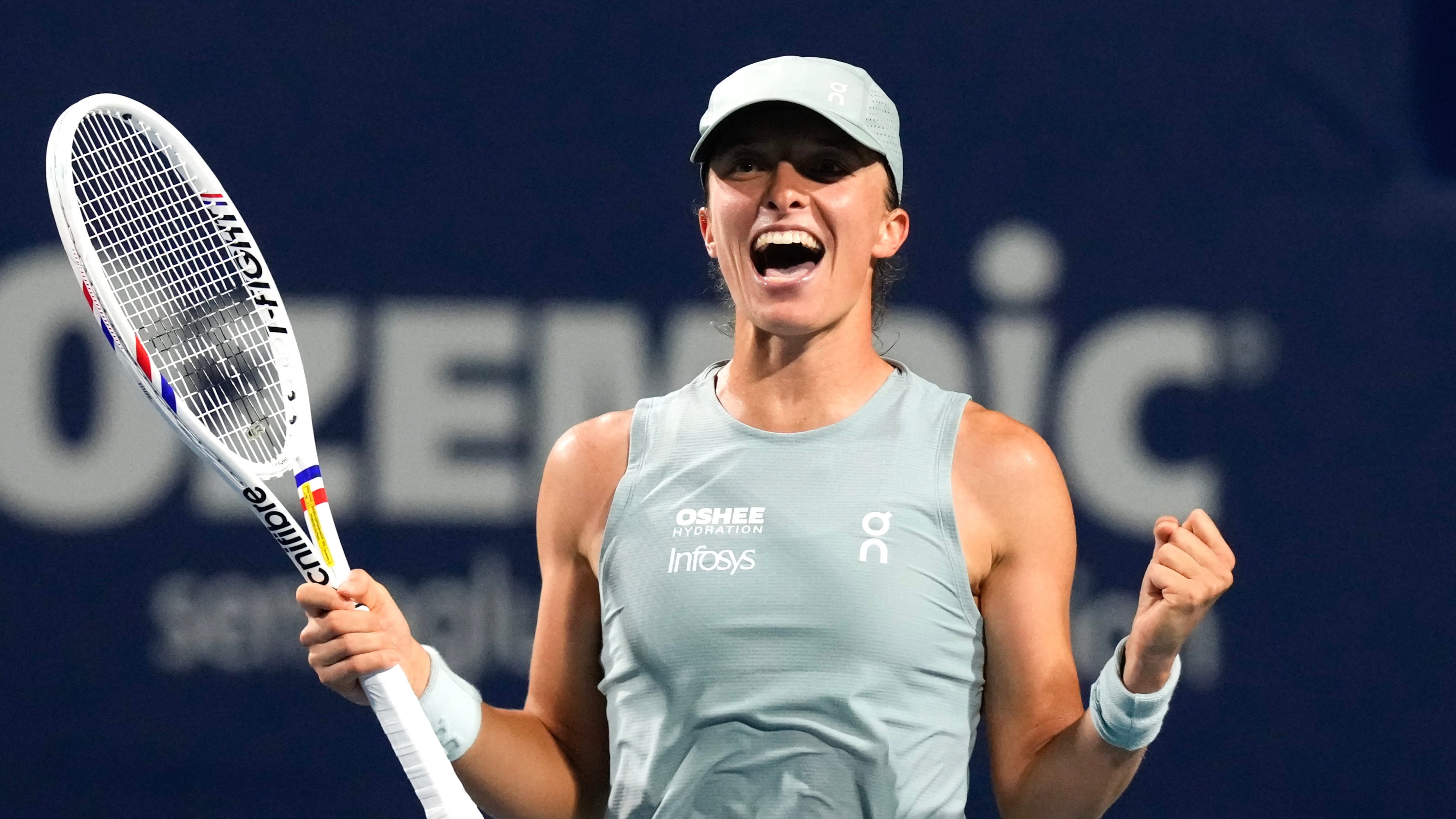 Poland's Iga Swiatek celebrates her 6-3 1-6 6-3 win over Ukraine's Elina Svitolina in a National Bank Open semifinal tennis match in Toronto on Wednesday, August 12, 2026. (Chris Young/The Canadian Press via AP)