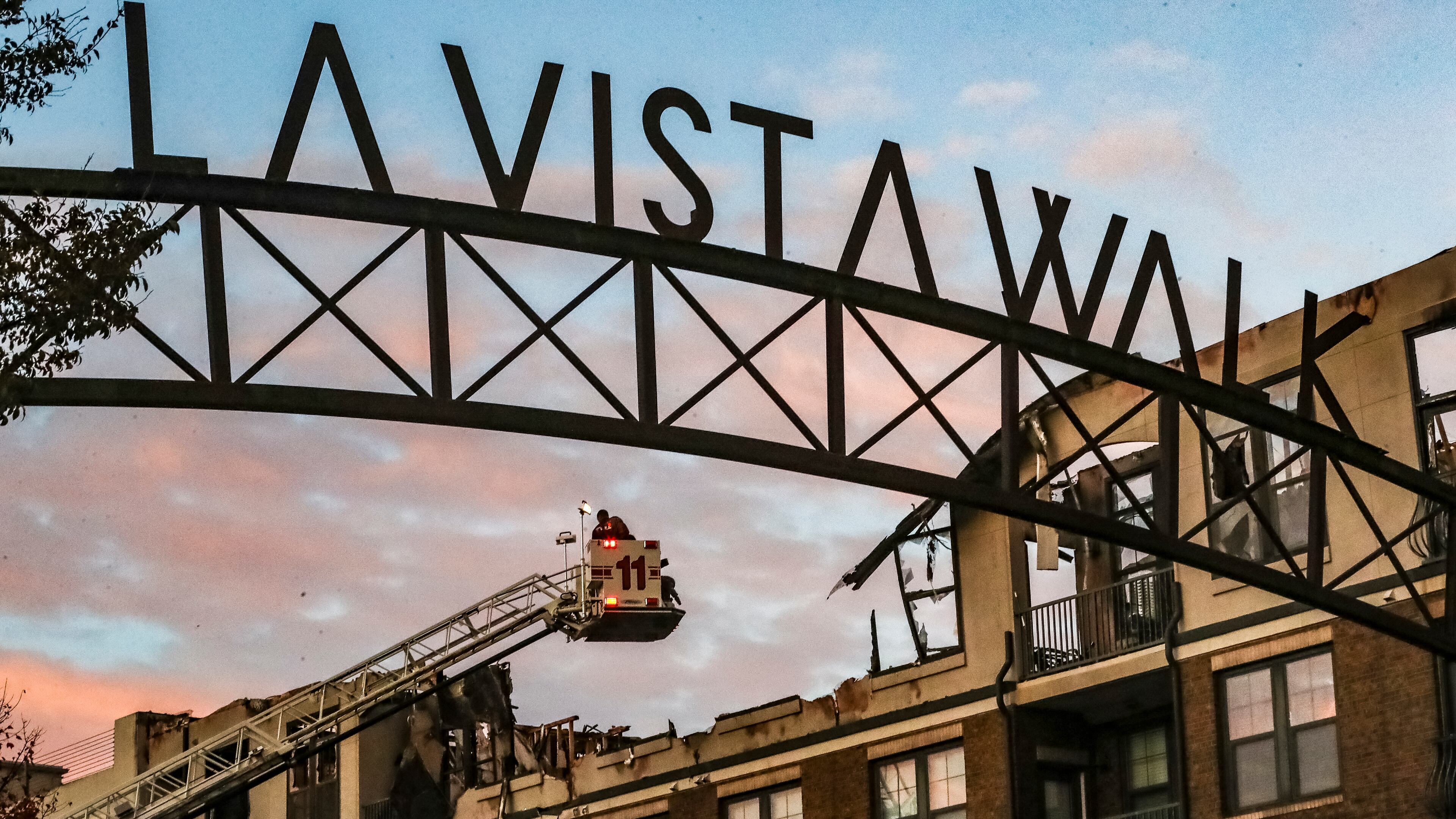 Two people were arrested after residents were forced to evacuate the Reserve at LaVista Walk apartments after a fire broke out Friday.