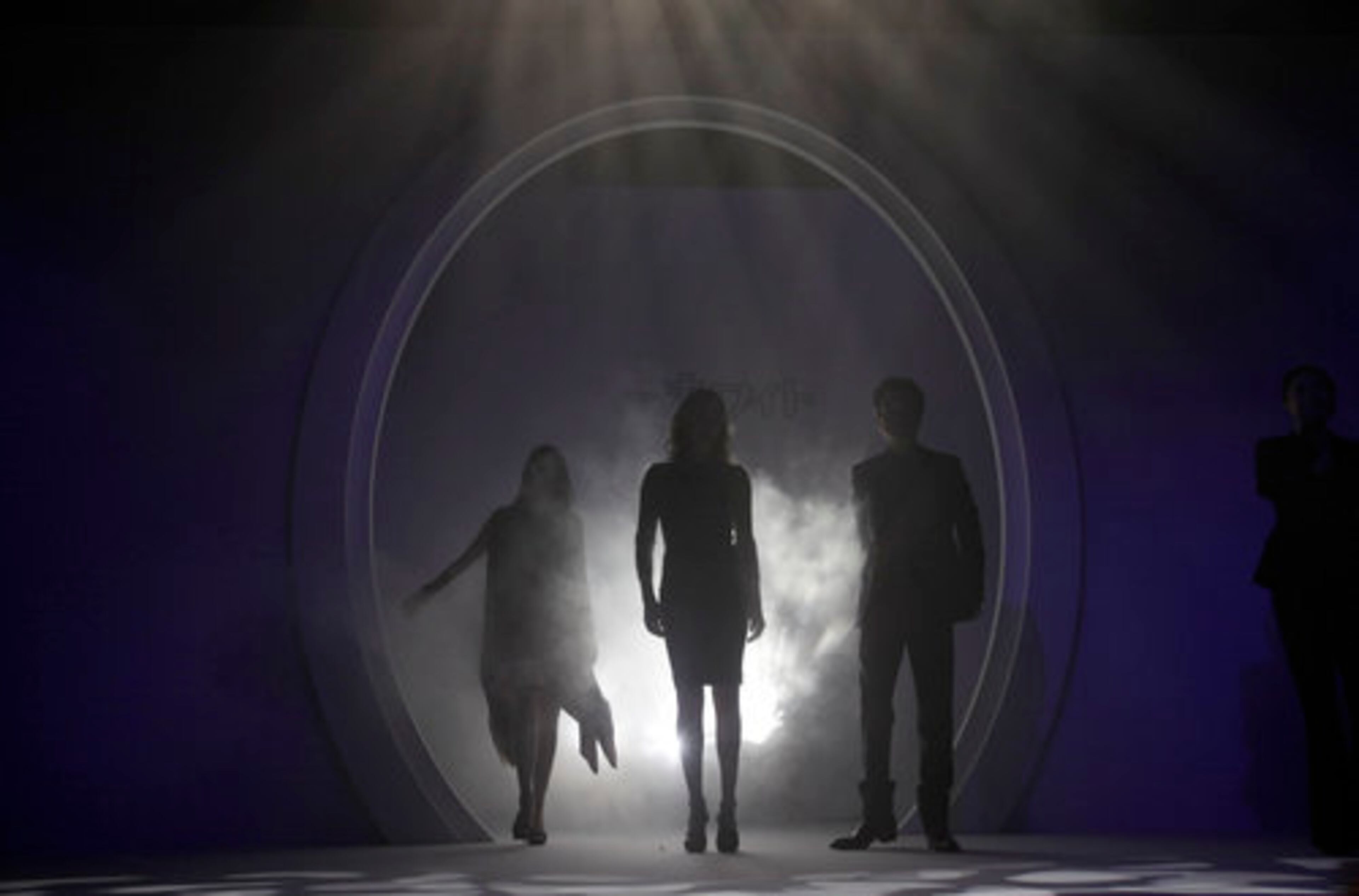 Stars of "Snow White And The Huntsman" make a dramatic entrance as they arrive for a promotional event Sunday of the film in Tokyo.