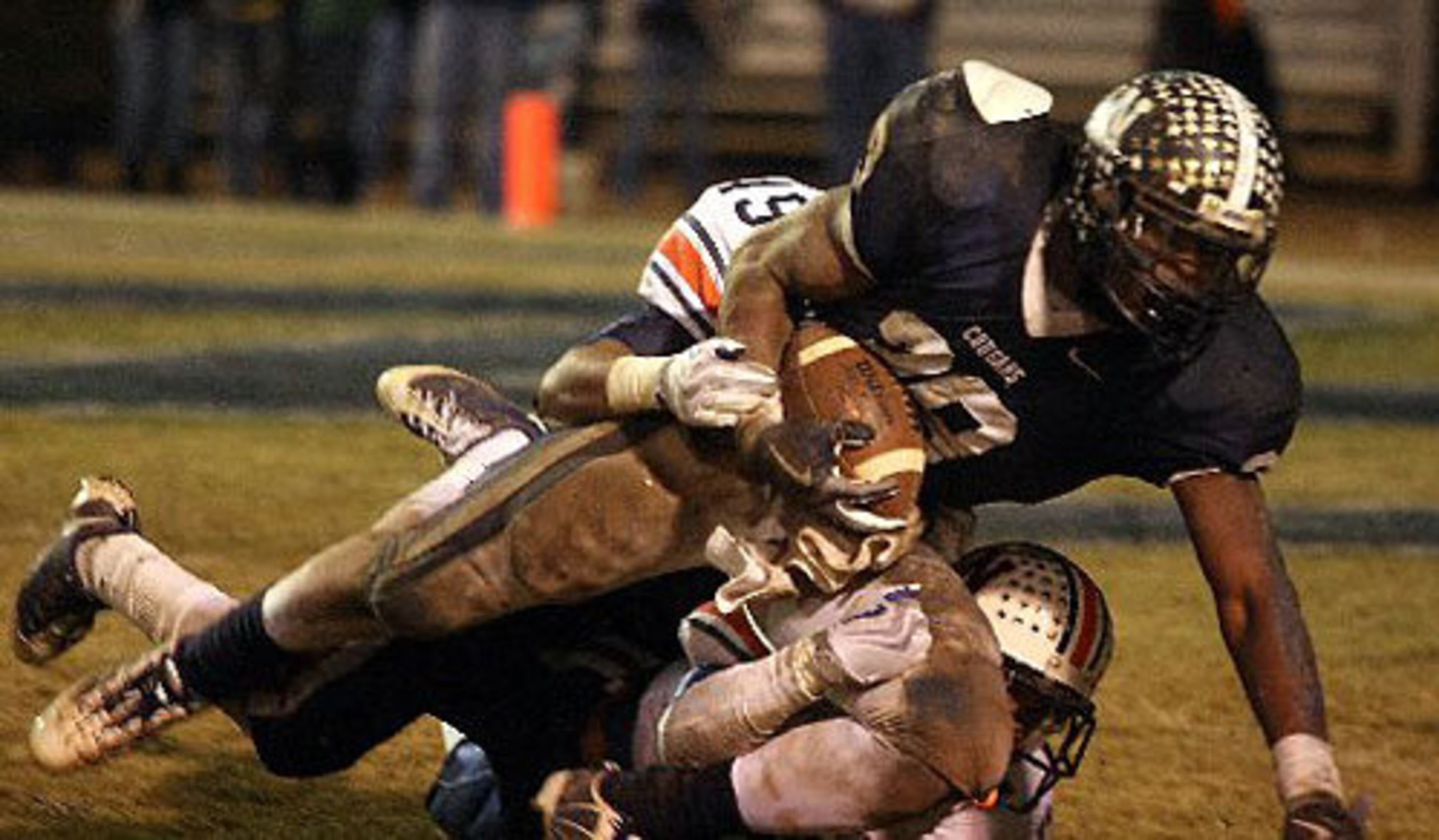 Newnan receiver Alec Ogletree (39) is brought down short of the goal line by Northside-Warner Robins defenders. The Cougars would score on the next play, but it was too little too late, with no time on the clock.