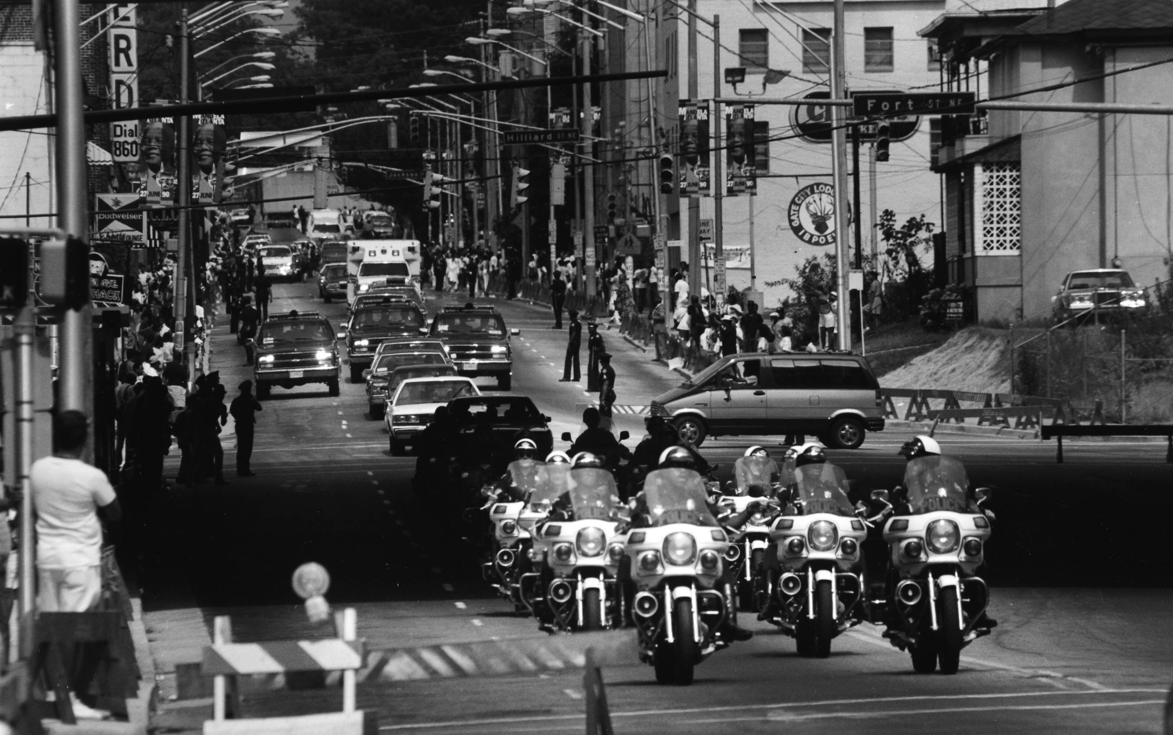 A Motorcade escorts South African anti-apartheid leader Nelson Mandela down Auburn Avenue to the Marin Luther King Jr. Memorial Center in June 1990. Marlene Karas / AJC