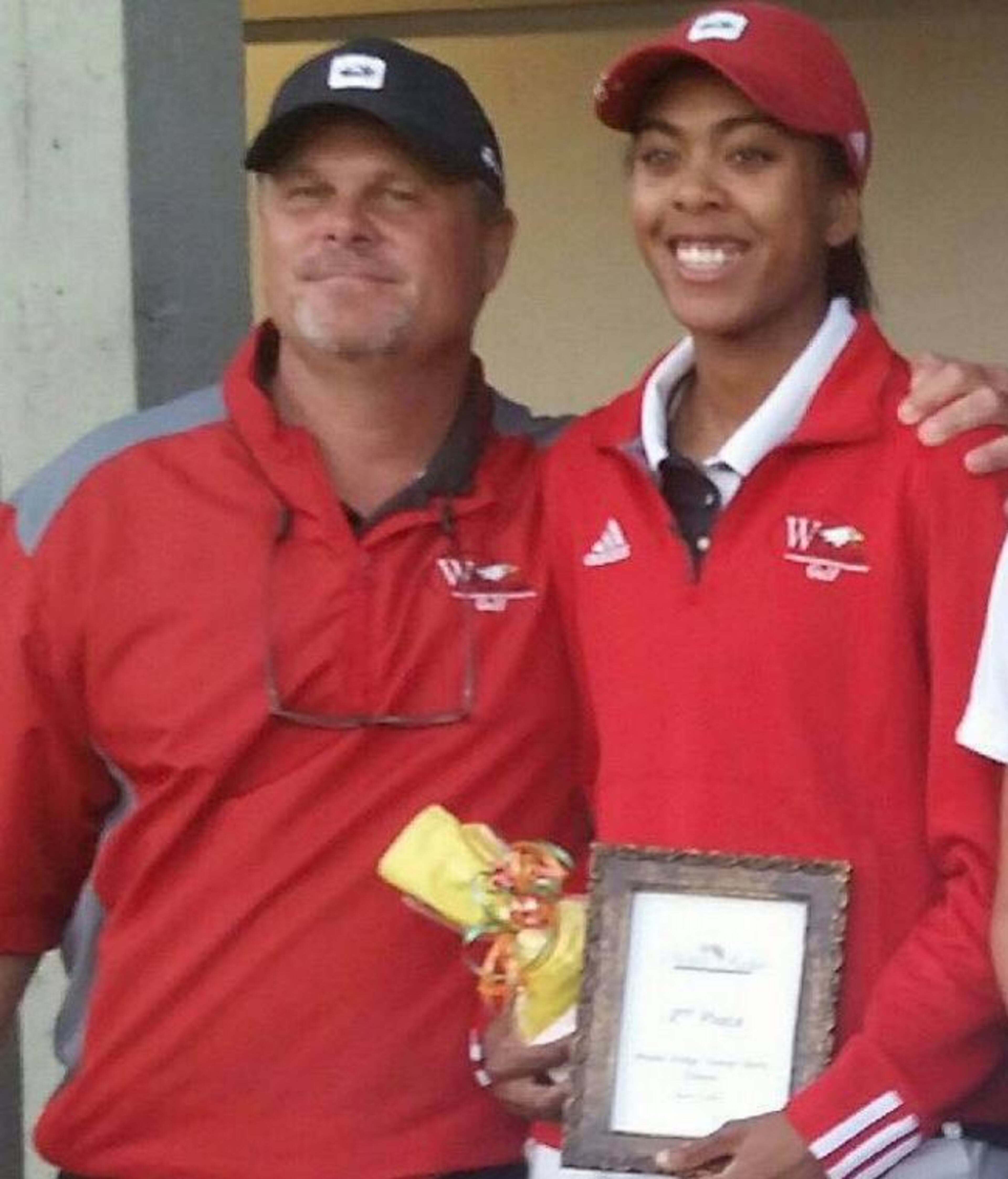 Woodward Academy's Ayanna Habeel and coach Pete Fritts