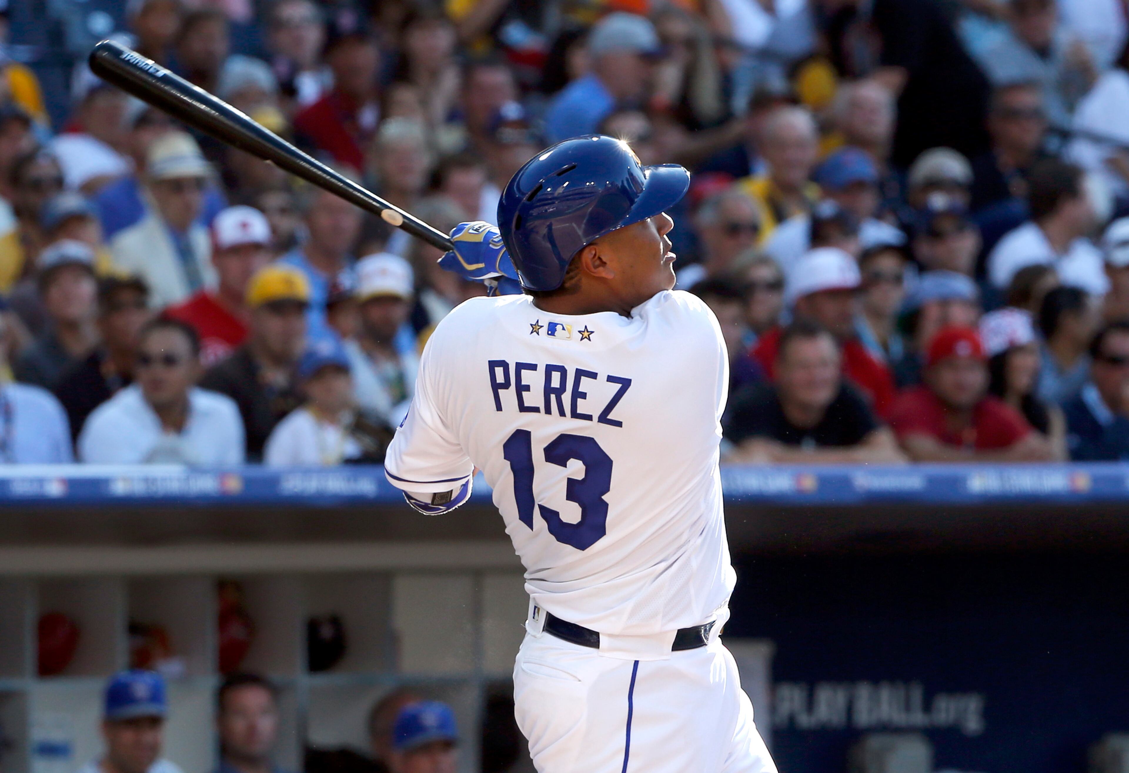 American League's Salvador Perez, of the Kansas City Royals, follows through on a two run home run during the second inning of the MLB baseball All-Star Game, Tuesday, July 12, 2016, in San Diego. (AP Photo/Lenny Ignelzi)