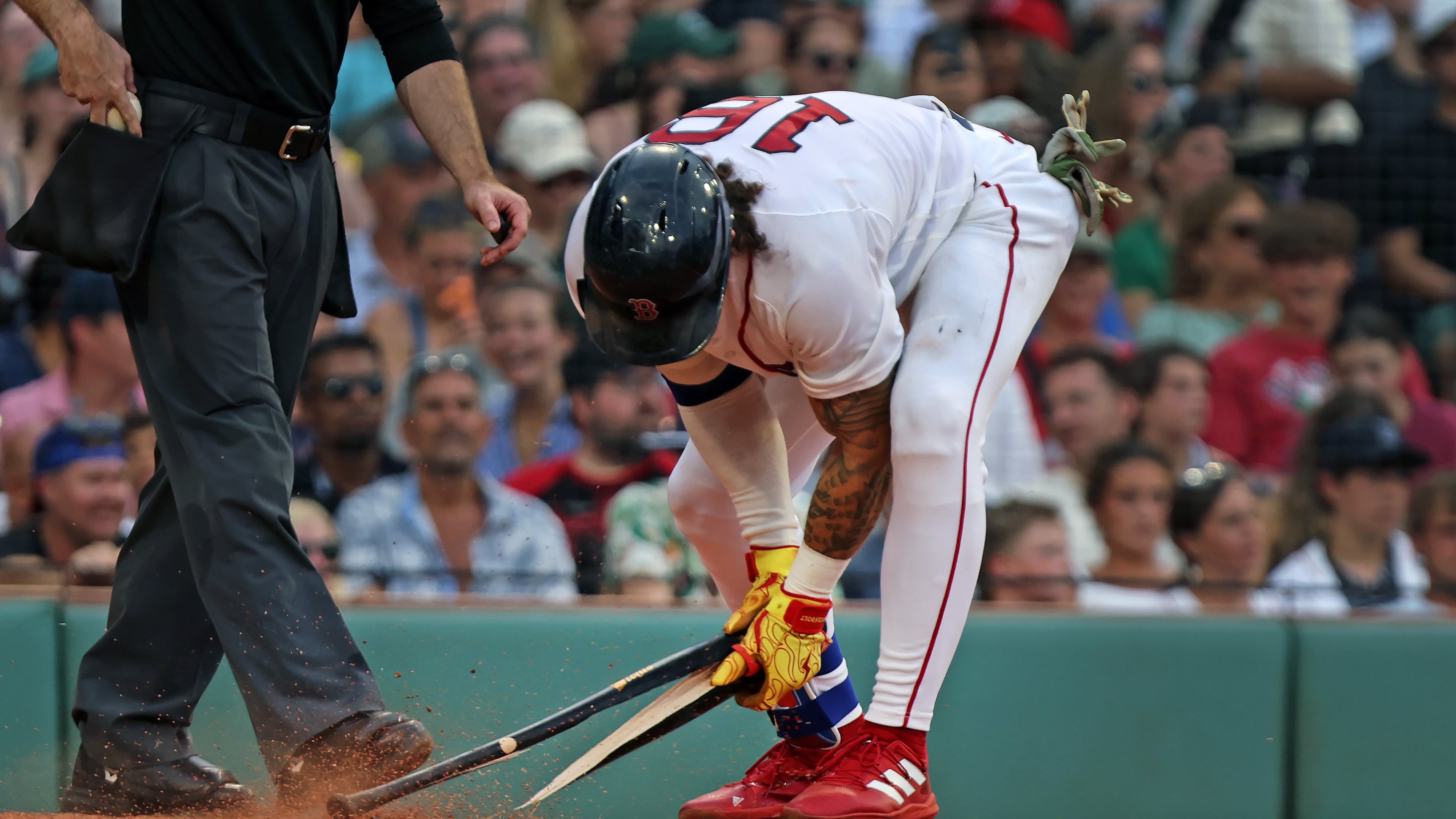 Boston Red Sox's Jarren Duran snaps his bat after striking out to end the eighth inning of a baseball game against the Athletics, Saturday, Aug. 8, 2026, in Boston. (AP Photo/Jim Davis)