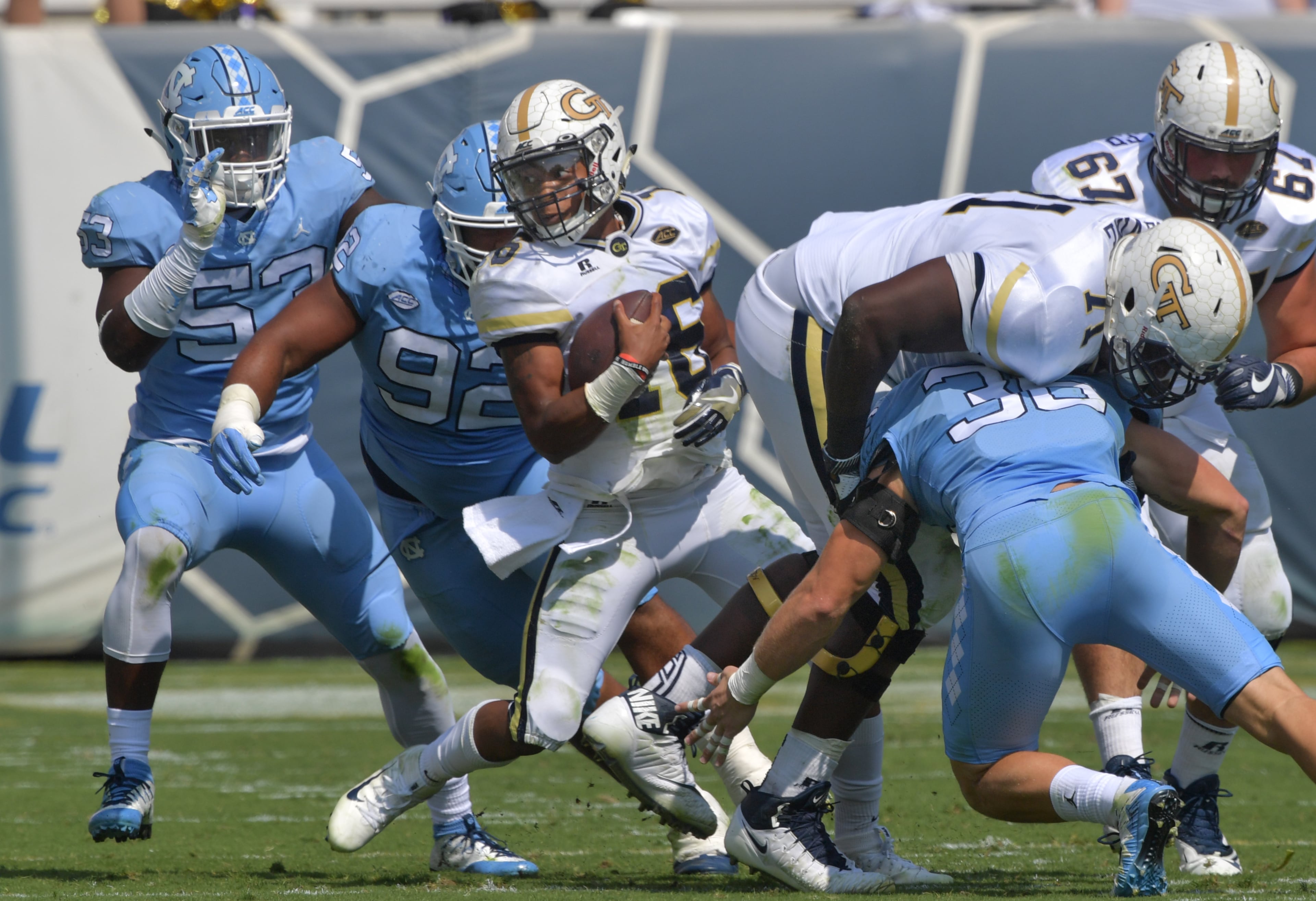 September 30, 2017 Atlanta - Georgia Tech quarterback TaQuon Marshall (16) runs for a first down in the first half of an NCAA college football game against the North Carolina at Bobby Dodd Stadium on Saturday, September 30, 2017. HYOSUB SHIN / HSHIN@AJC.COM