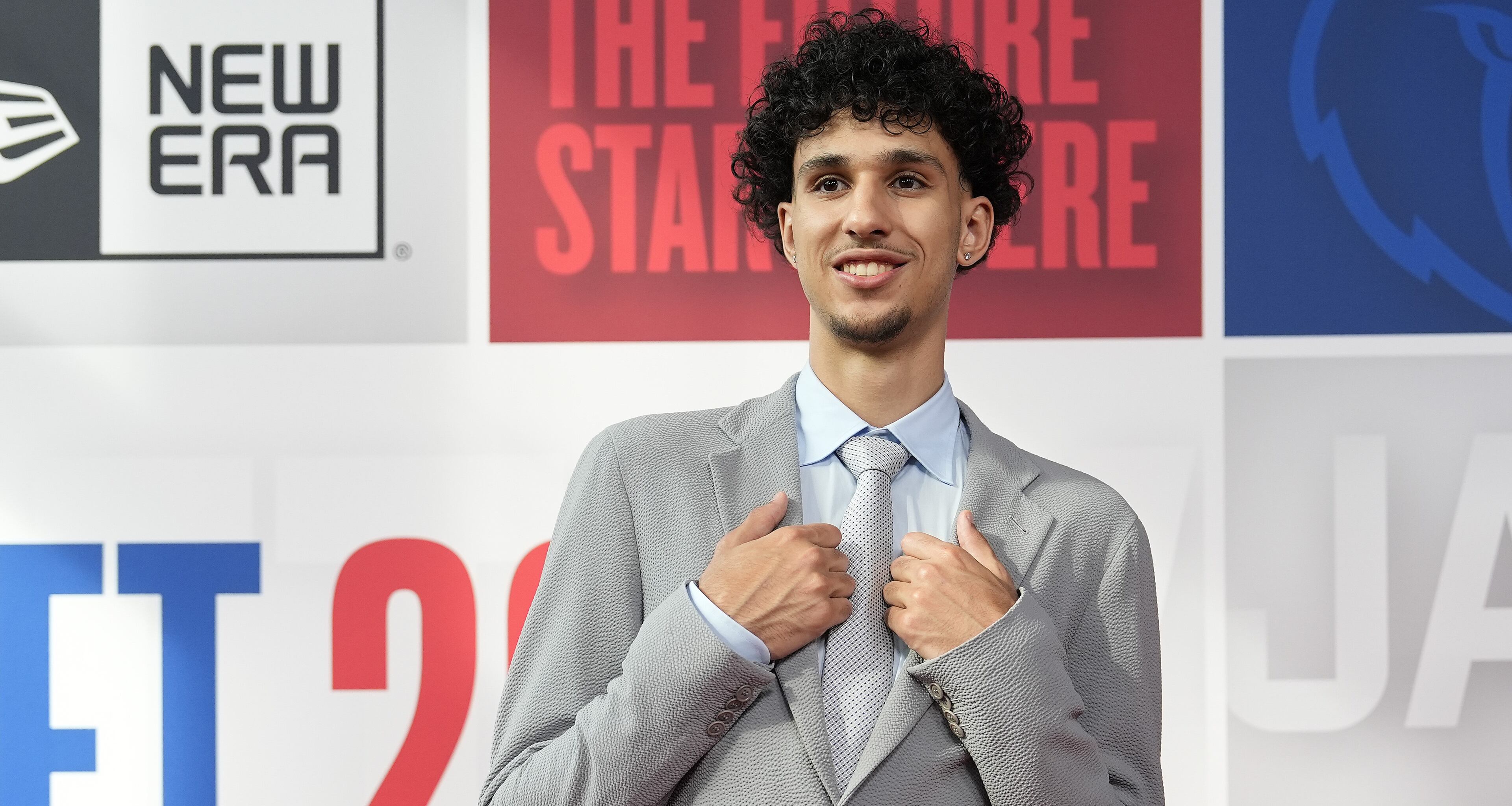 Zaccharie Risacher walks the red carpet before the NBA basketball draft, Wednesday, June 26, 2024, in New York. (AP Photo/Julia Nikhinson)
