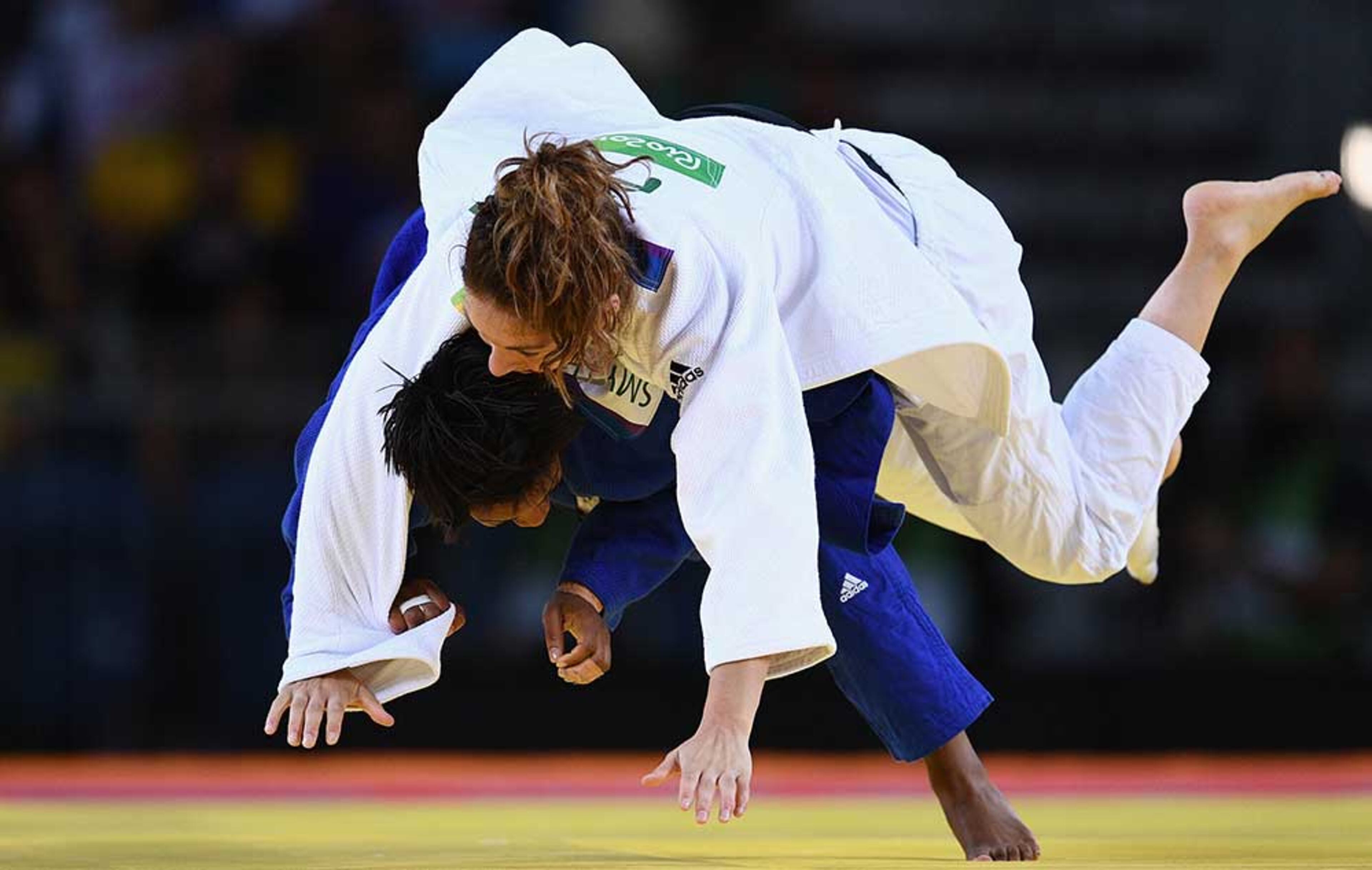 Nekoda Smythe-Davis of Great Britain (blue) competes against Automne Pavia of France in the Women's -57 kg Judo elimination round on Day 3 of the Rio 2016 Olympic Games at Carioca Arena 2 on August 8, 2016 in Rio de Janeiro, Brazil. (Photo by David Ramos/Getty Images)