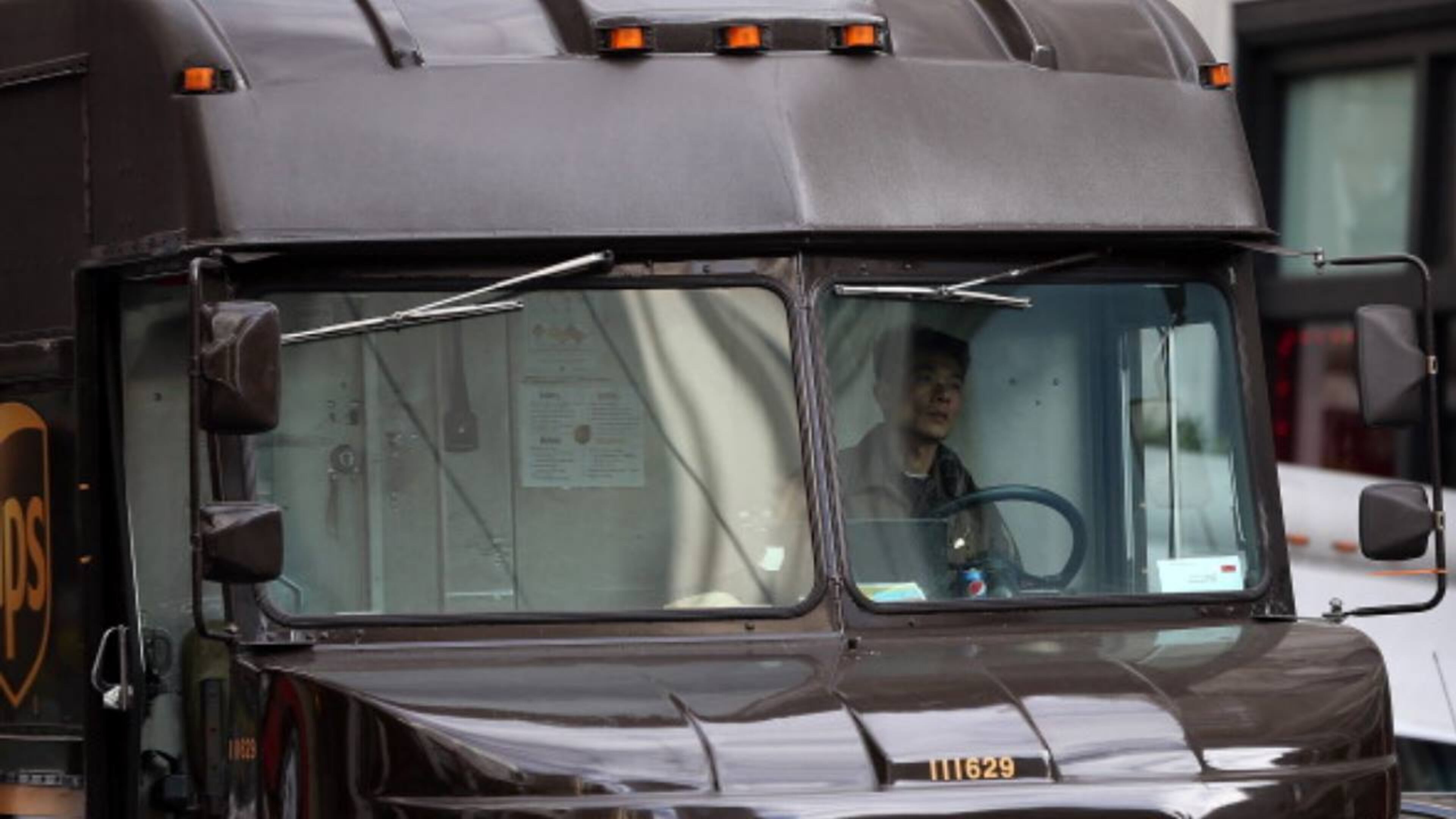 A UPS driver in Houston prevented package theft when he realized a woman asking for the item was using a fake ID.