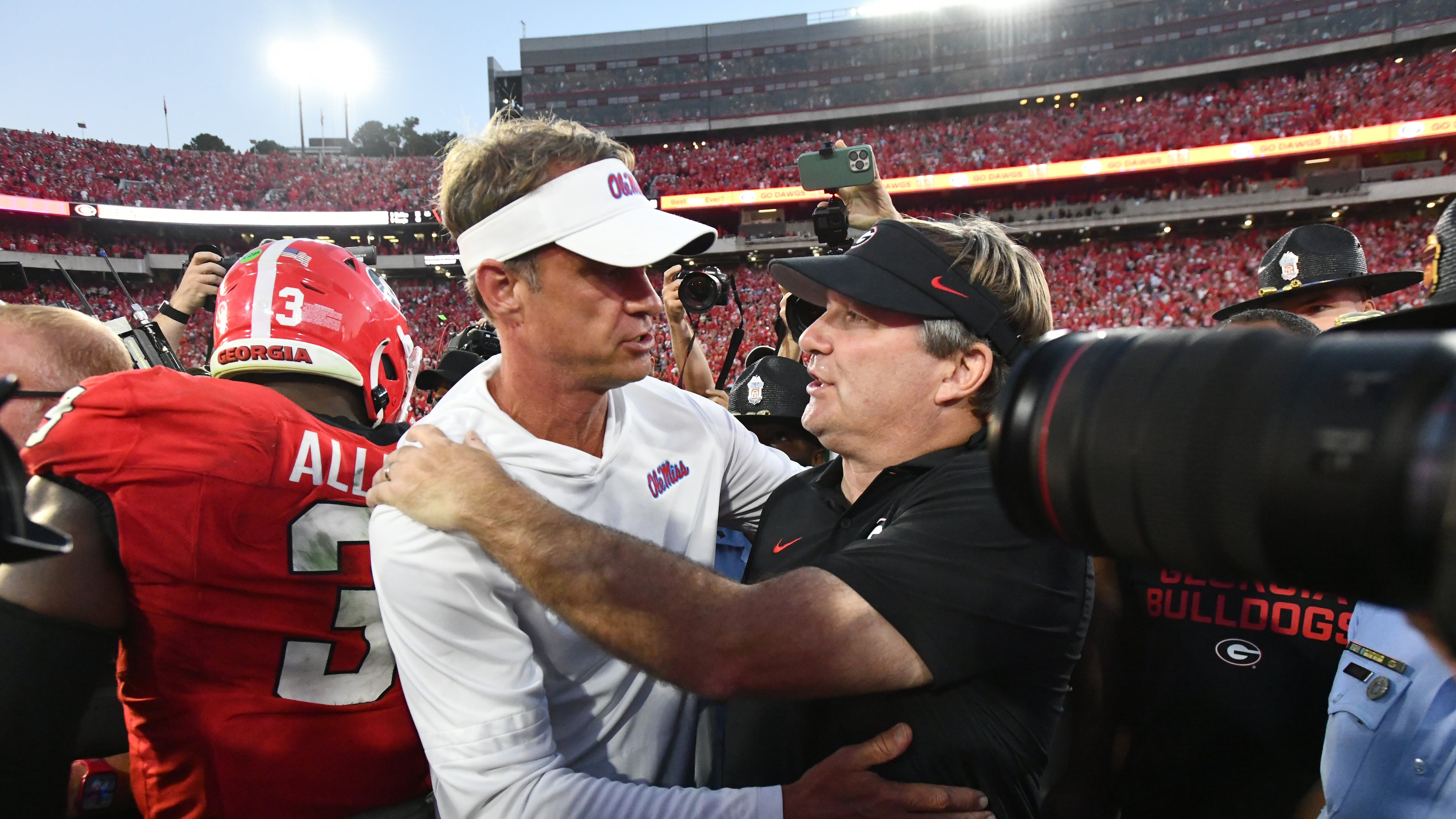 Georgia head coach Kirby Smart and Mississippi head coach Lane Kiffin shake hands after a UGA victory at Sanford Stadium in October. (Hyosub Shin/AJC)