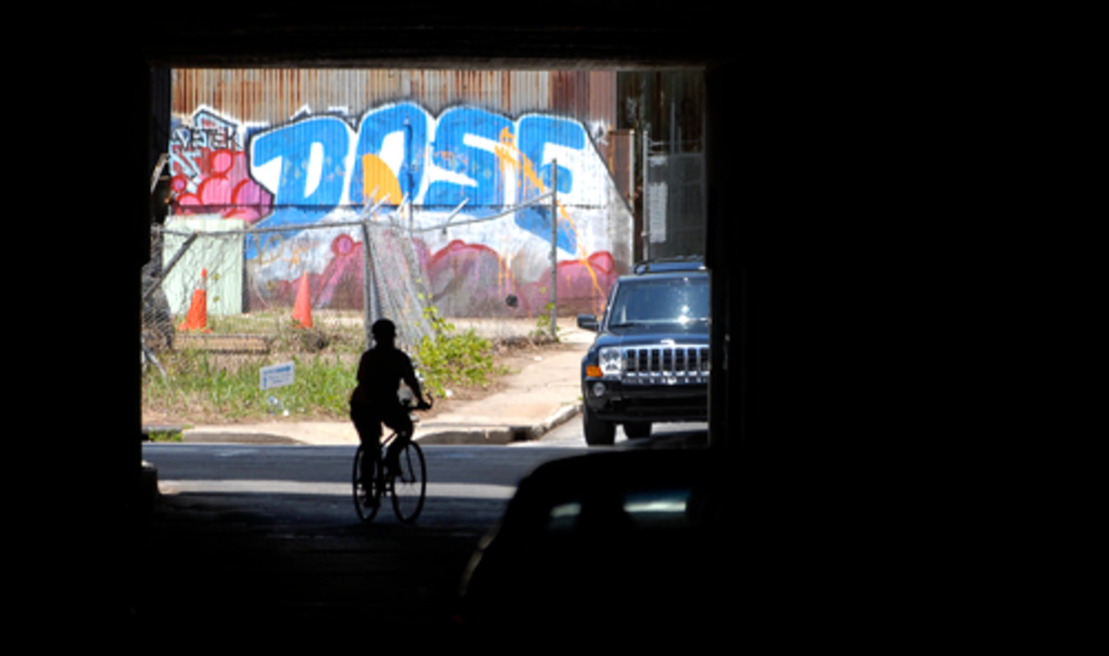 A rider cruises through the Krog Street tunnel while on the tour. The Beltline will include parks, trails, travel corridors and new and commercial development.