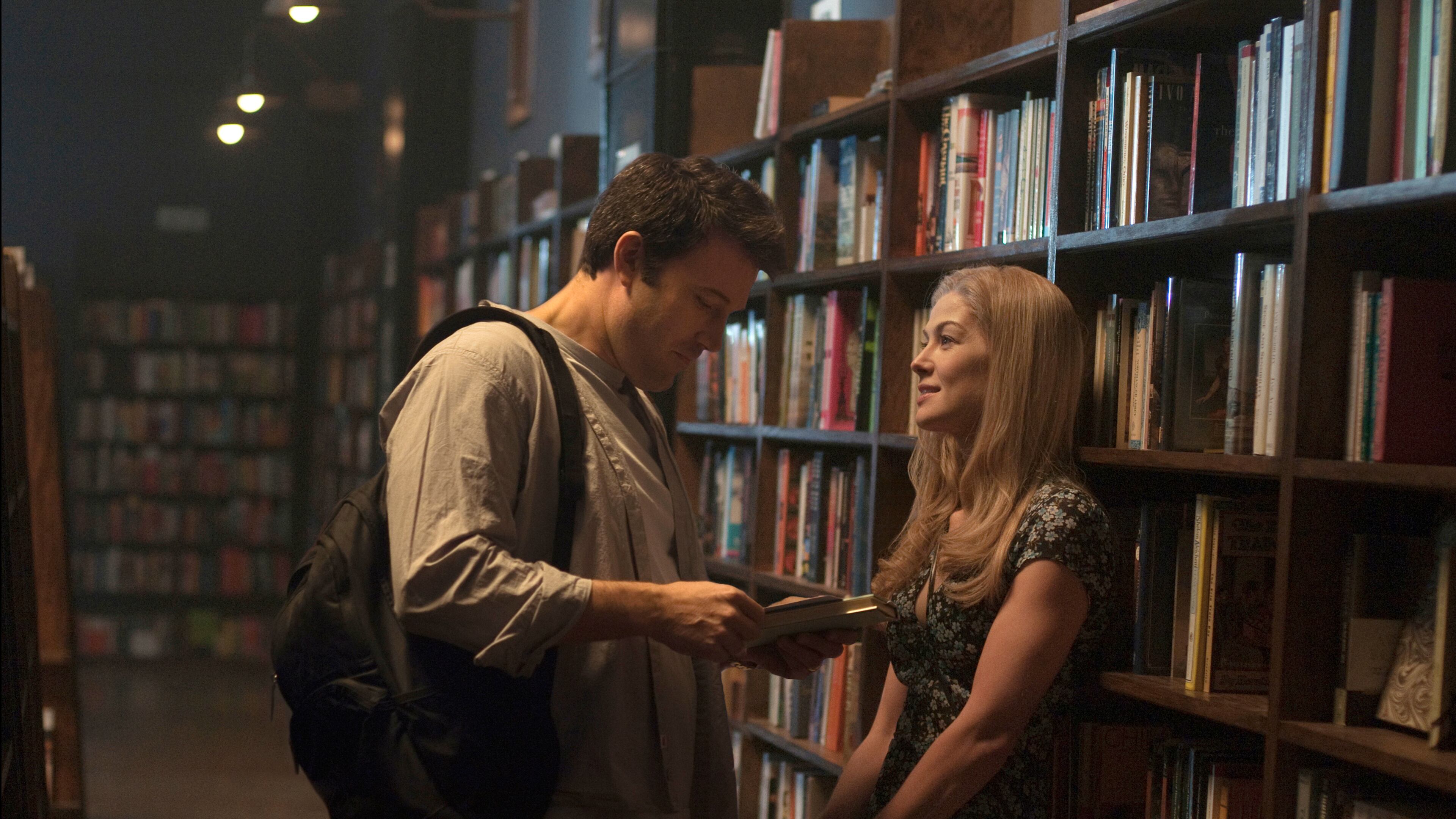 In this image released by 20th Century Fox, Ben Affleck, left, and Rosamund Pike appear in a scene from "Gone Girl." (AP Photo/20th Century Fox, Merrick Morton)