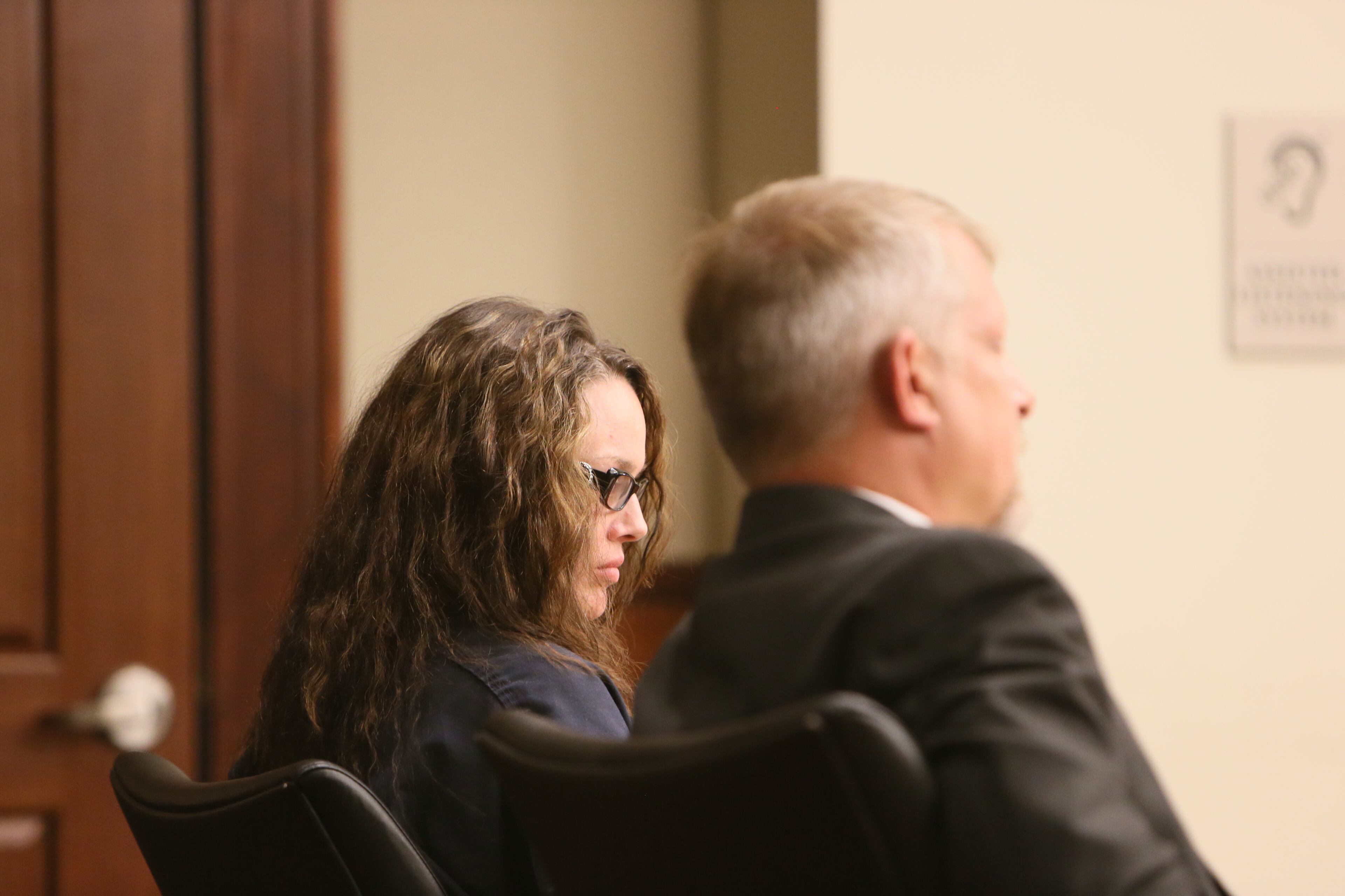 In a navy jail suit, Anna Benson, 37, sat quietly Thursday afternoon in Cobb County Superior Court as her attorney asked Judge LaTain Kell to grant $50,000 bond, along with numerous stipulations, including psychological evaluation and treatment. Benson has been in jail since July 7, when she was arrested after allegedly threatening her husband, armed with several weapons, at his Smyrna home.